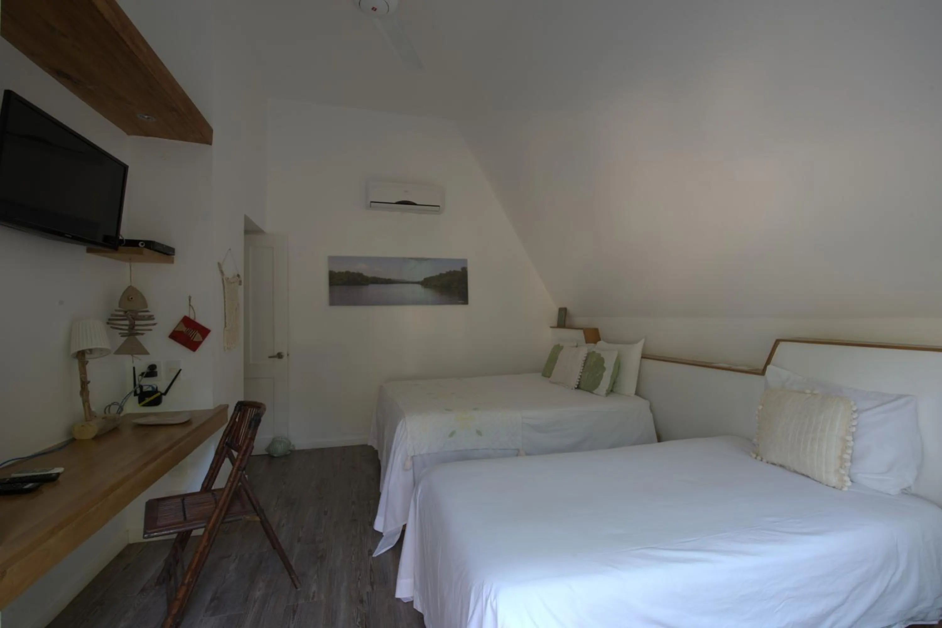 Bed in Punta Rucia Lodge Hotel Boutique & Spa