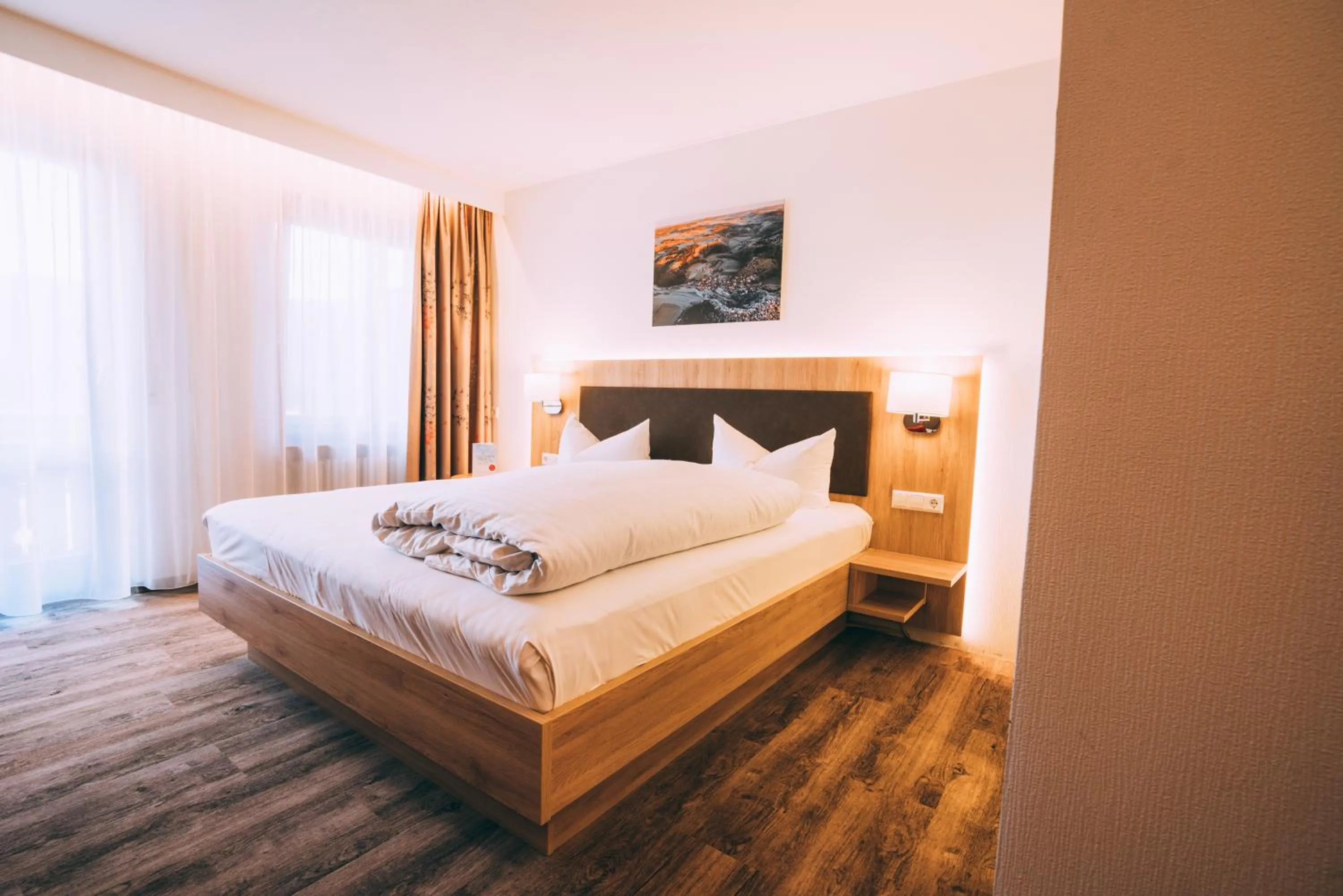 Bed in Flair Hotel Gasthof zum Hirsch