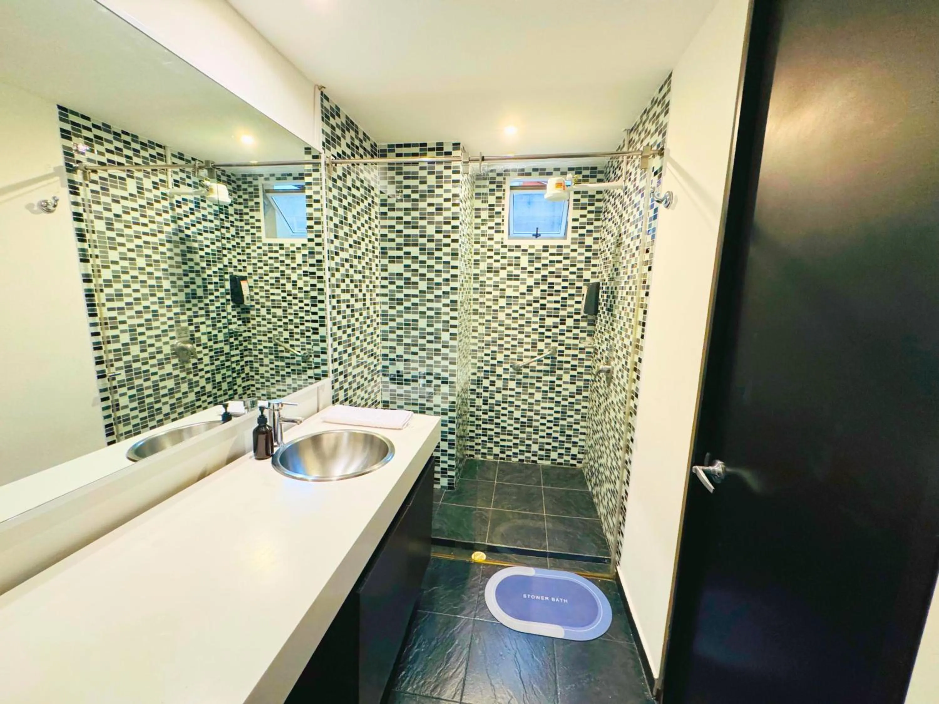 Shower in Aparta Suite Continental Bogotá