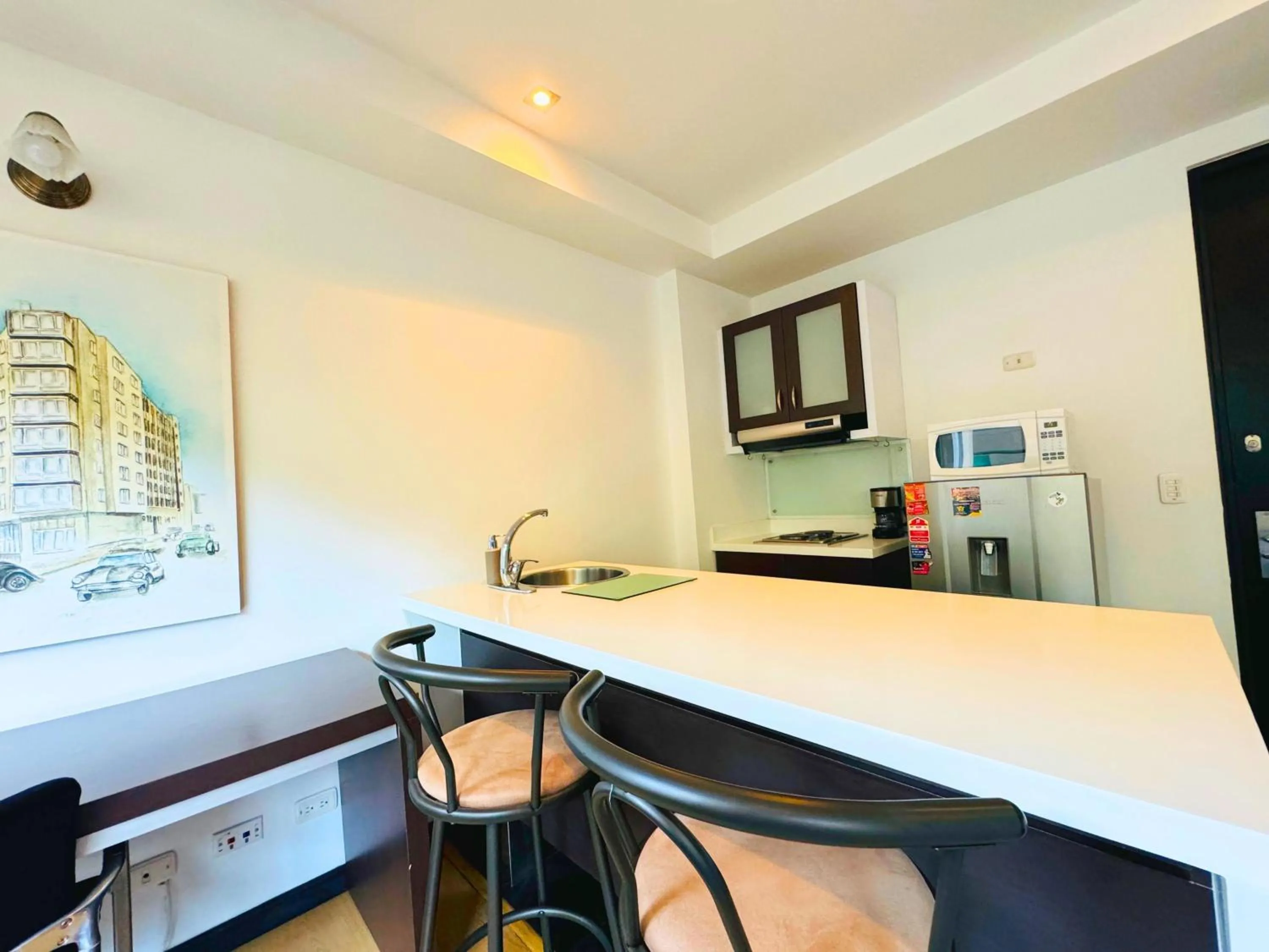 Kitchen or kitchenette in Aparta Suite Continental Bogotá