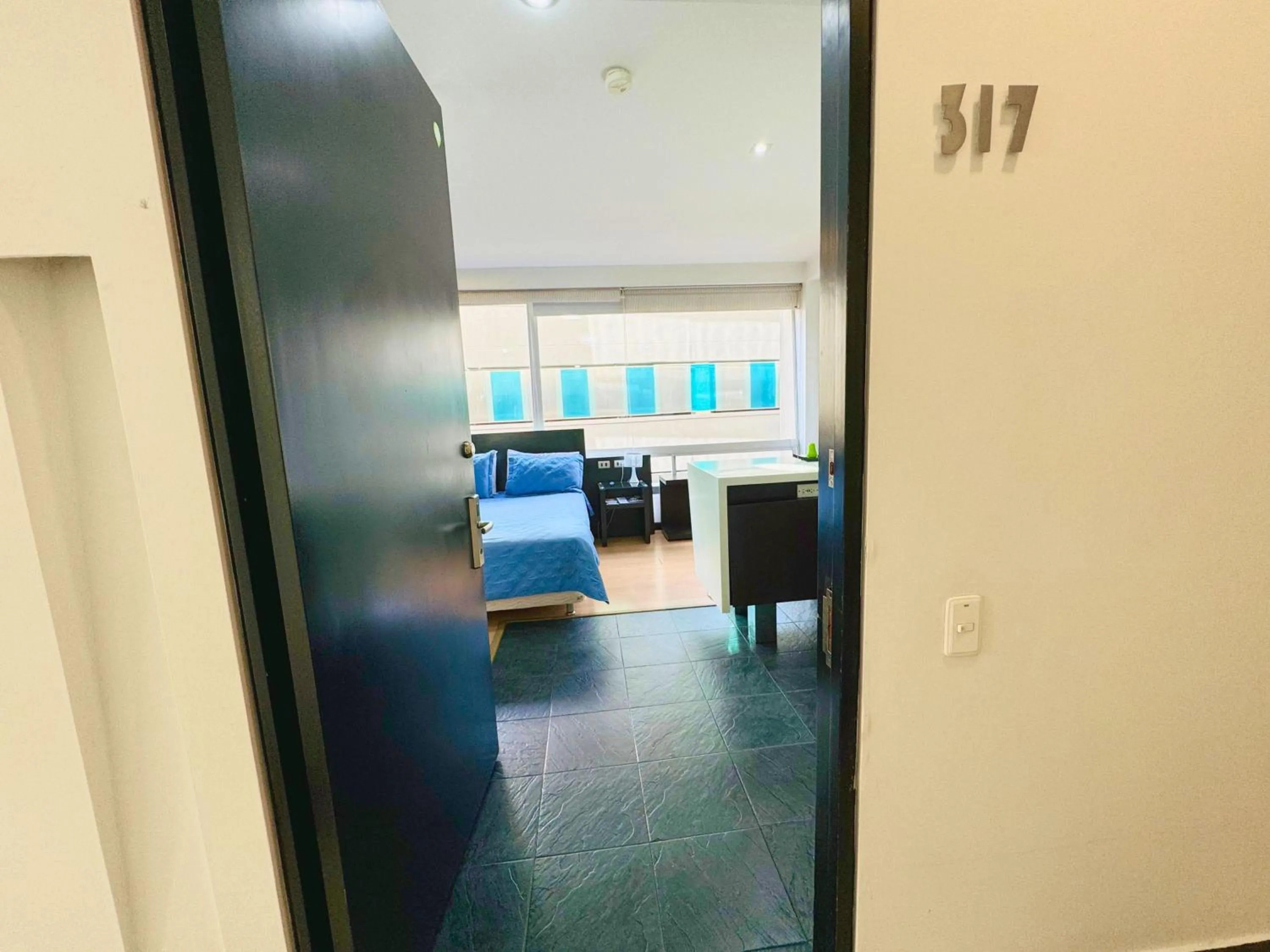 Bed in Aparta Suite Continental Bogotá