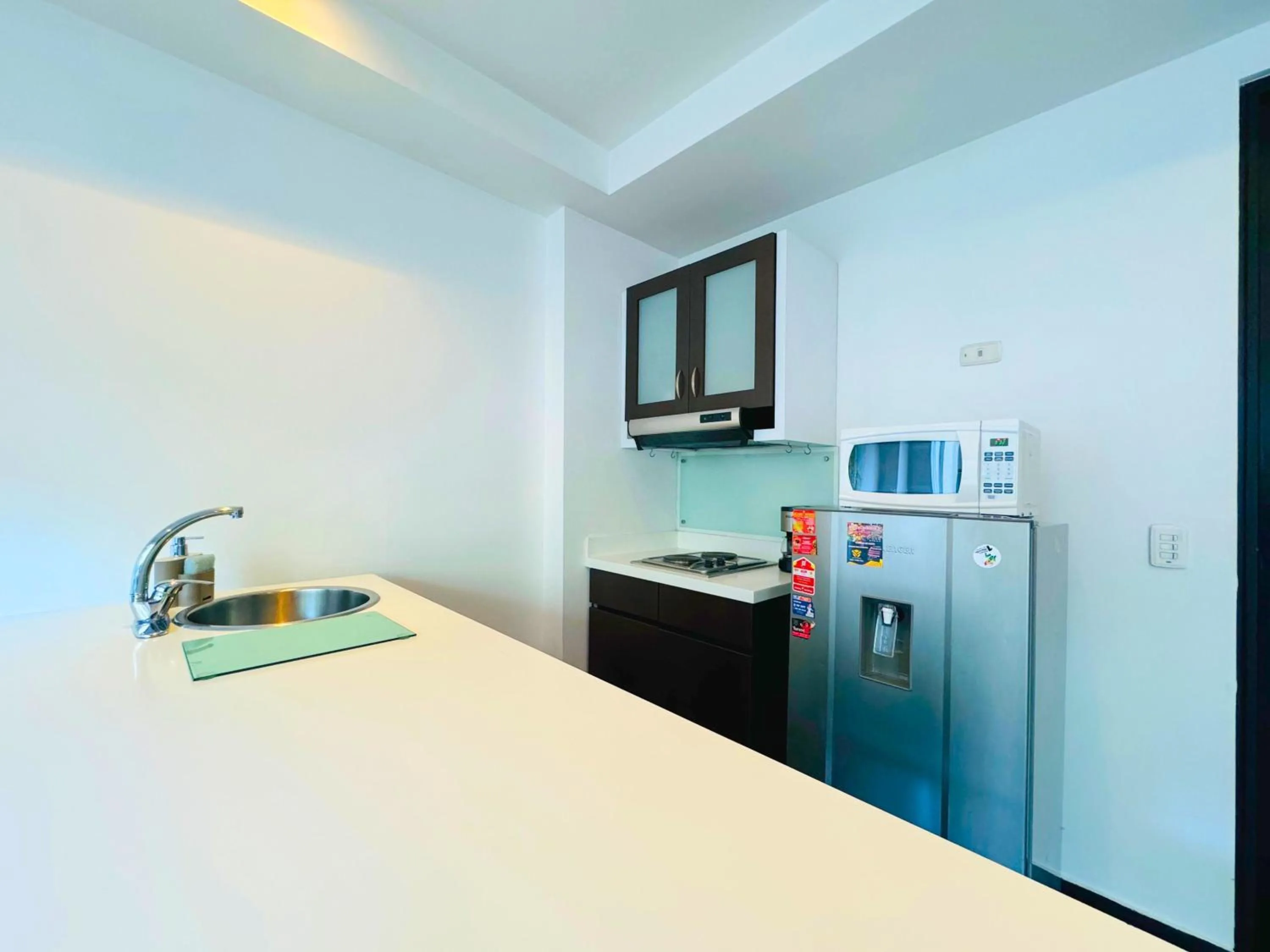 Kitchen or kitchenette in Aparta Suite Continental Bogotá