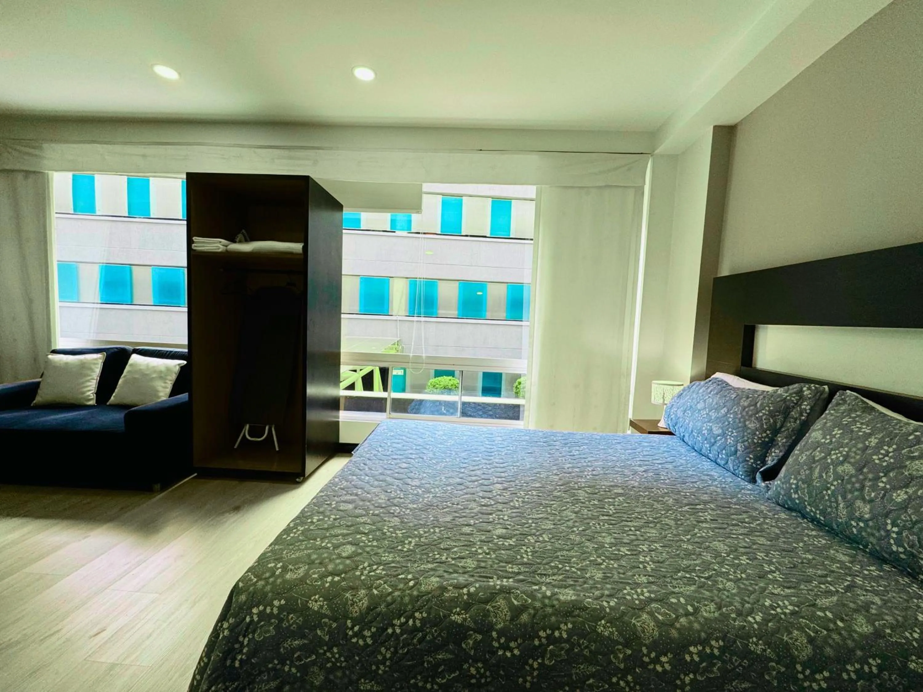 Bed in Aparta Suite Continental Bogotá