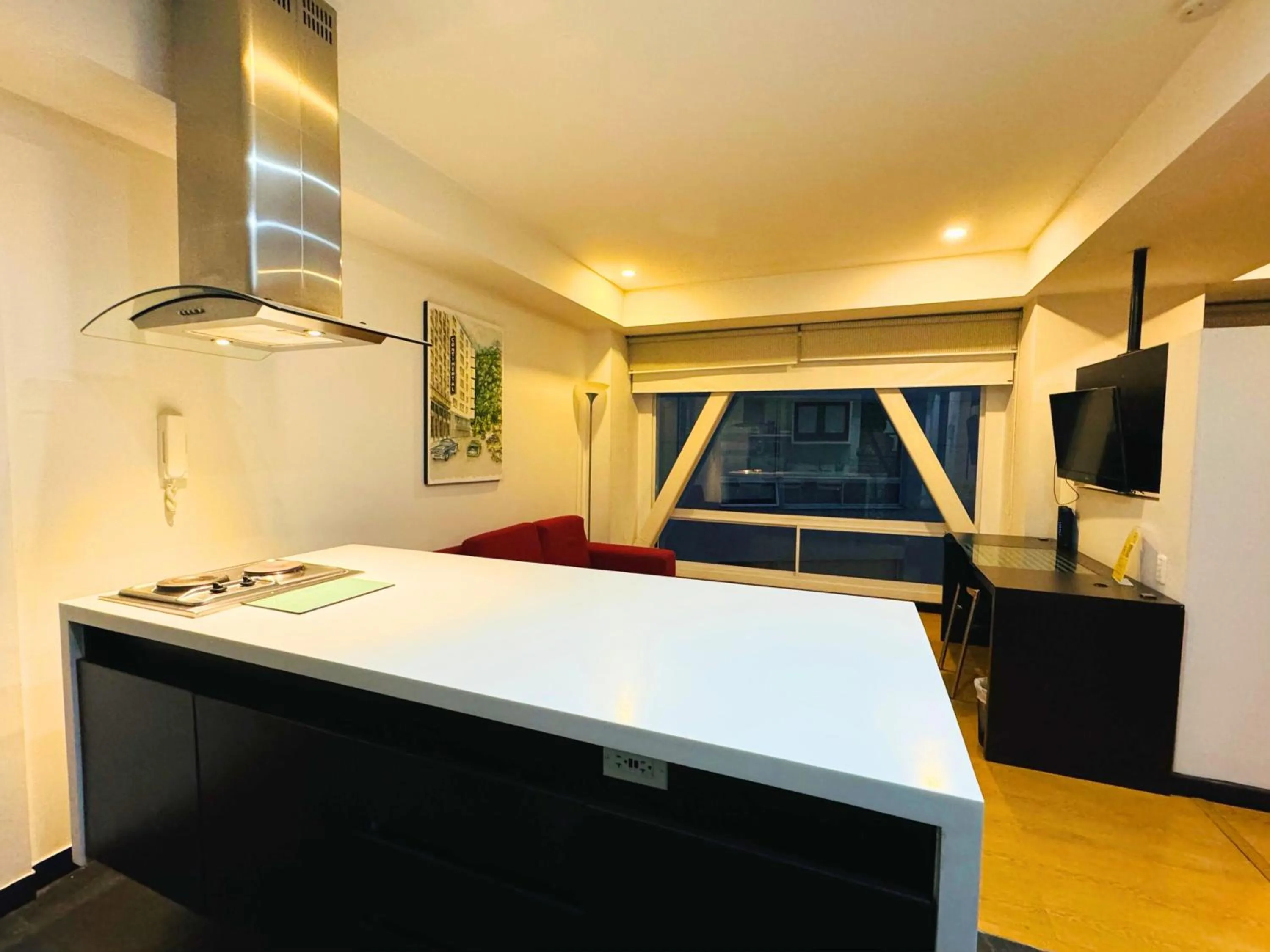 Kitchen or kitchenette in Aparta Suite Continental Bogotá