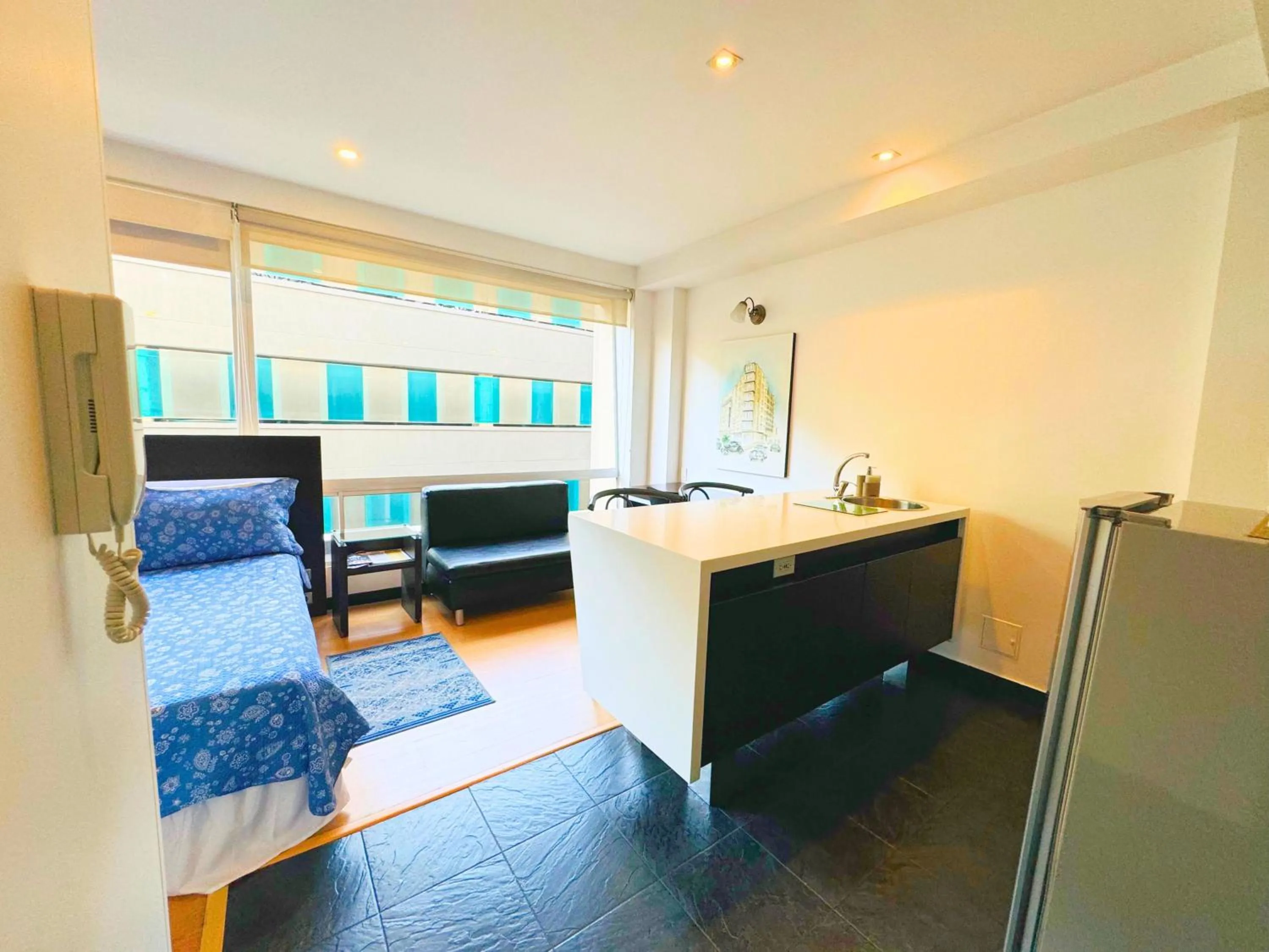 Kitchen or kitchenette in Aparta Suite Continental Bogotá