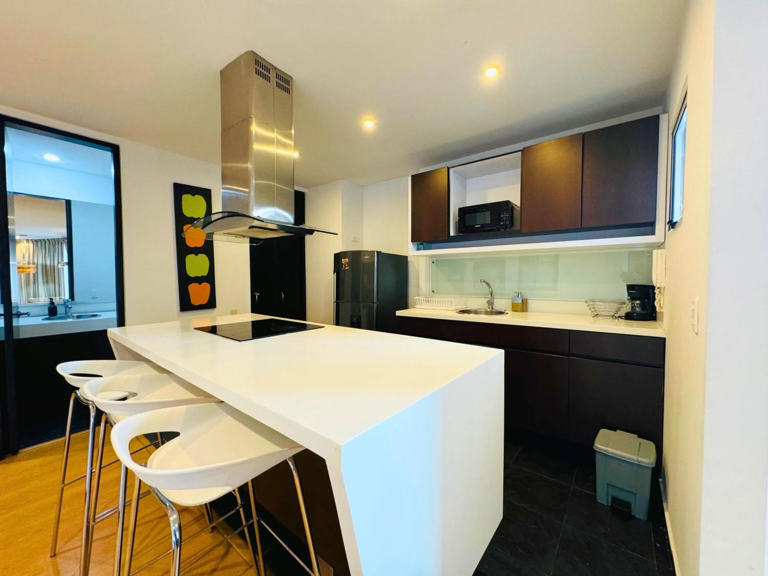 Kitchen or kitchenette in Aparta Suite Continental Bogotá