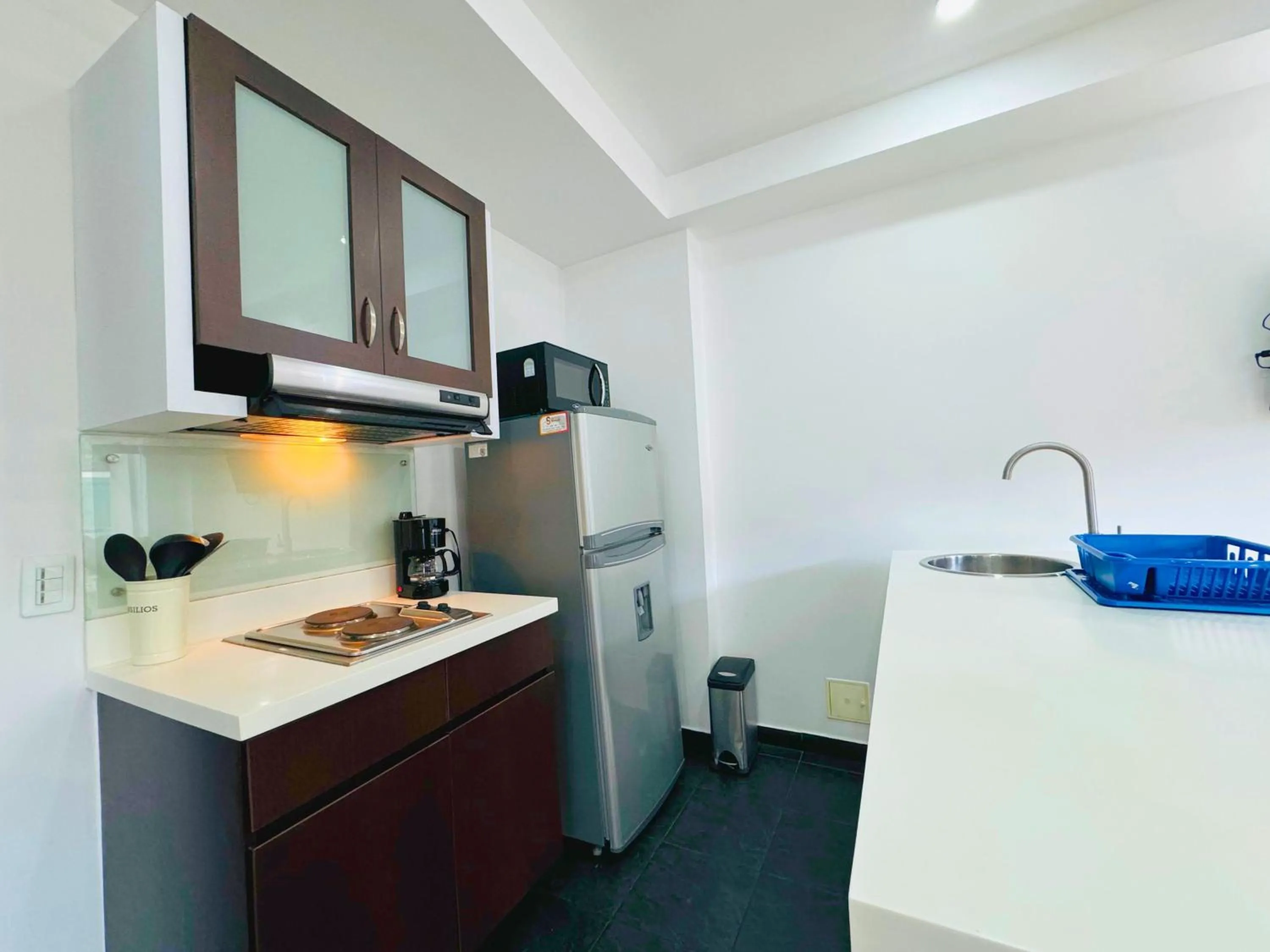 Kitchen or kitchenette in Aparta Suite Continental Bogotá