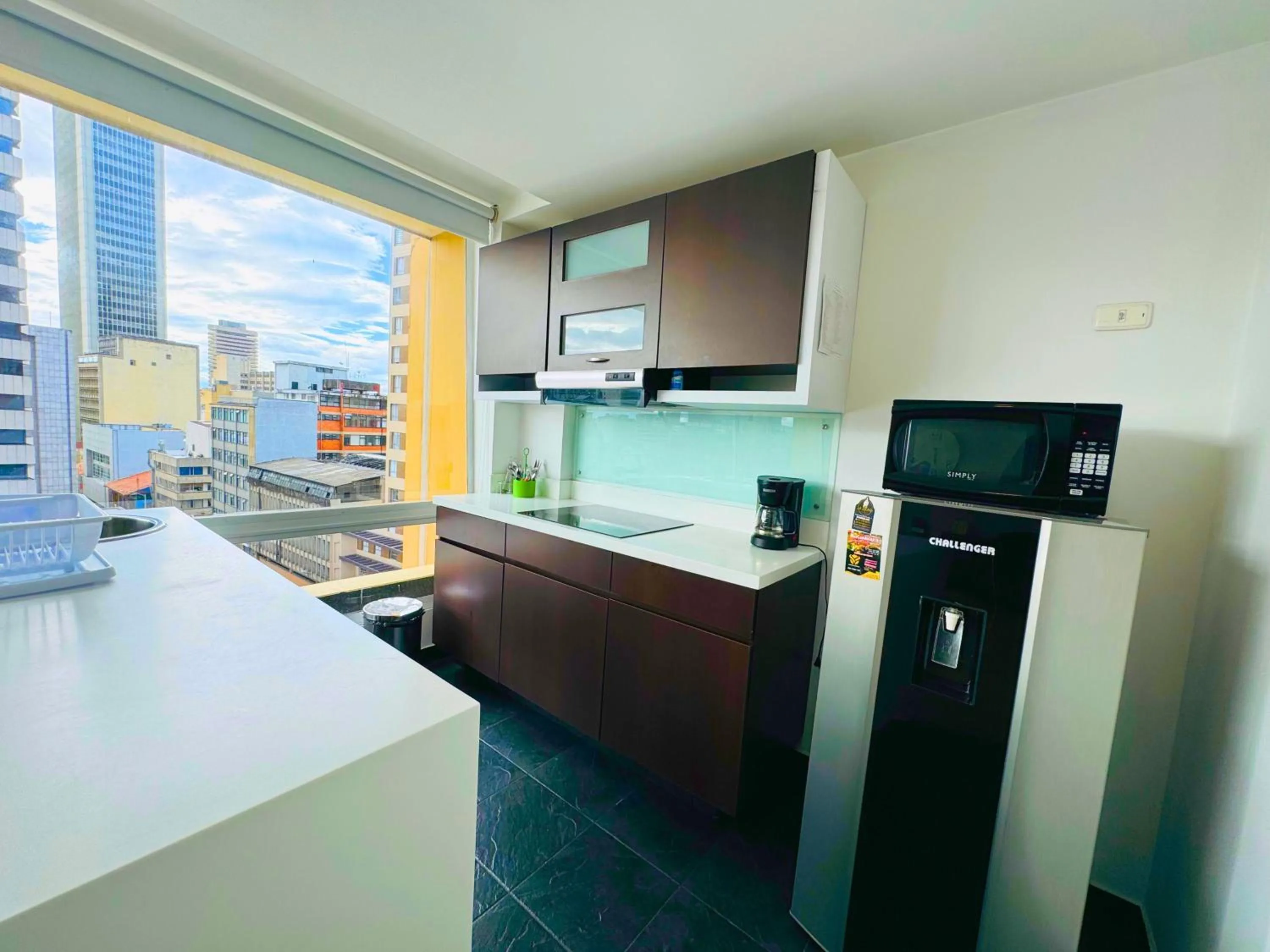 Kitchen or kitchenette in Aparta Suite Continental Bogotá