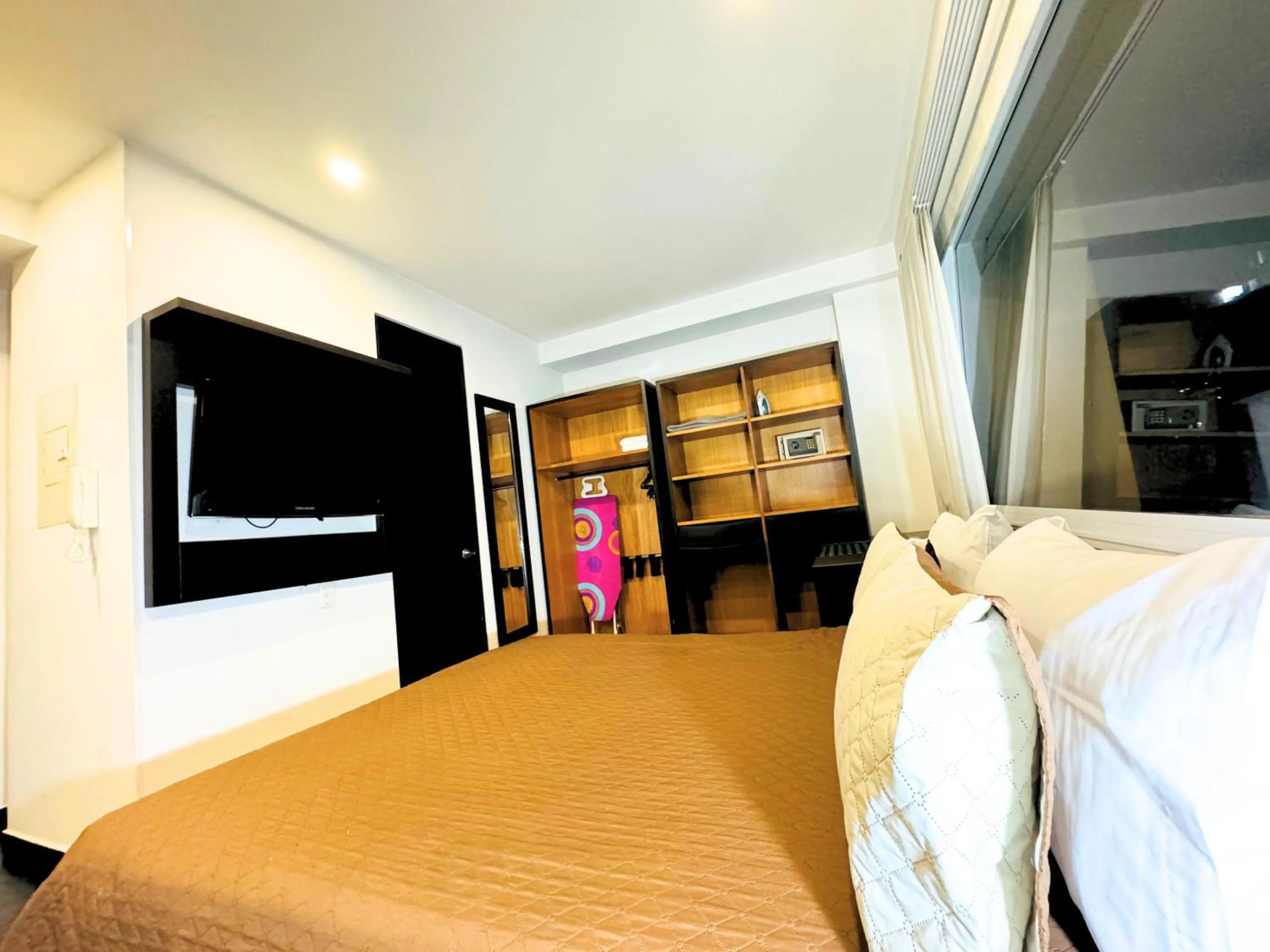 Bedroom, Bed in Aparta Suite Continental Bogotá