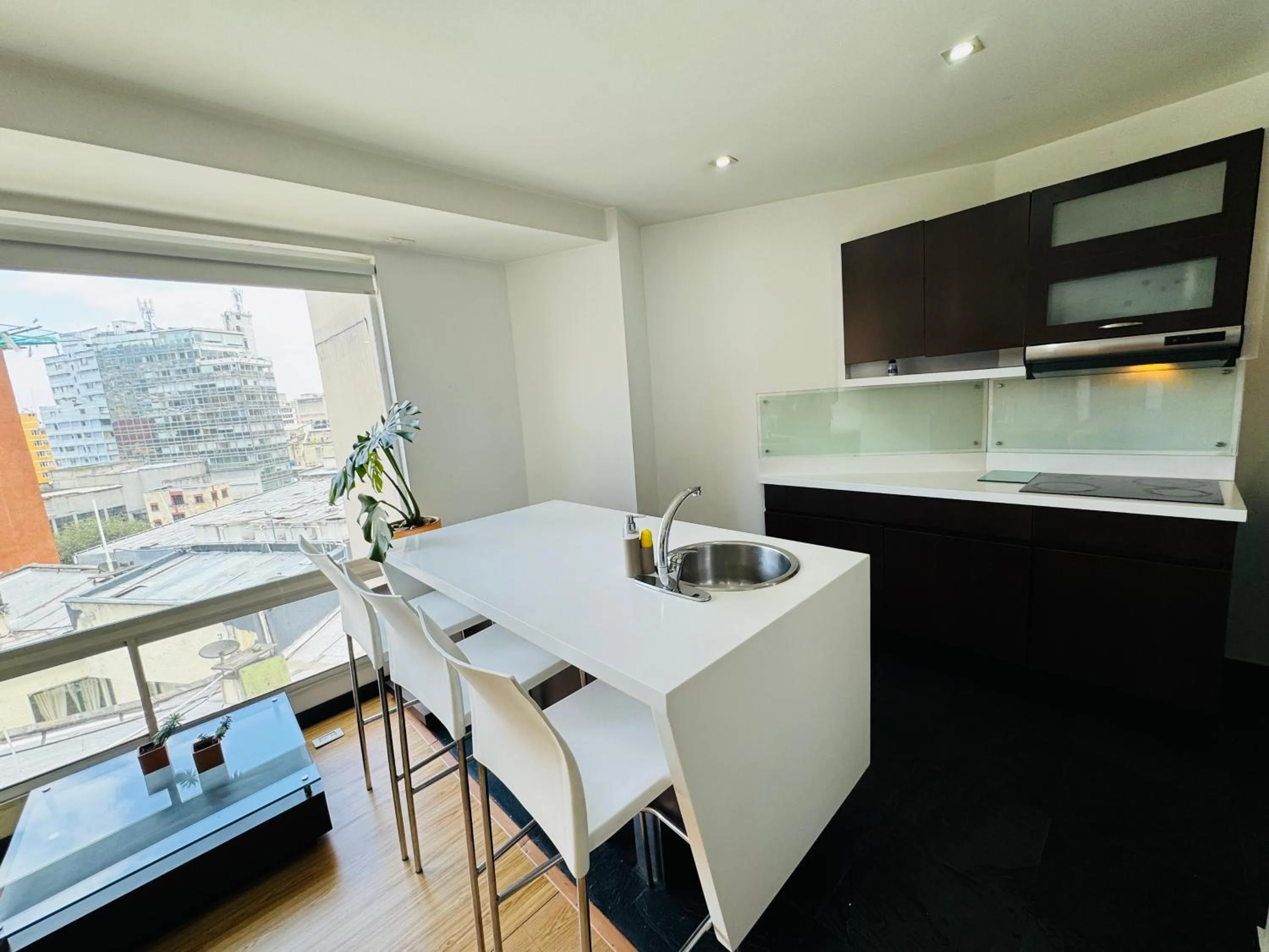 Kitchen or kitchenette in Aparta Suite Continental Bogotá
