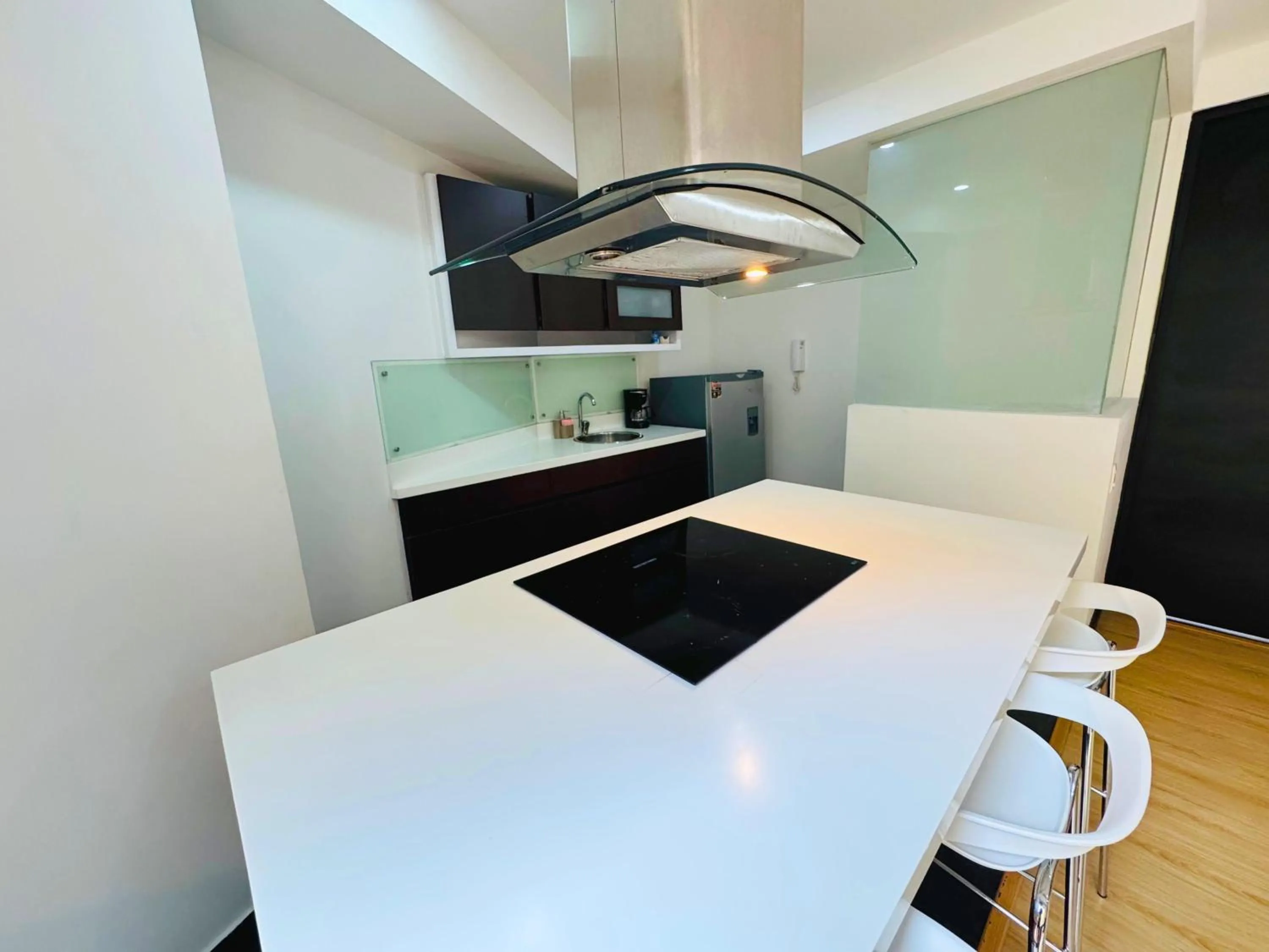 Kitchen or kitchenette in Aparta Suite Continental Bogotá