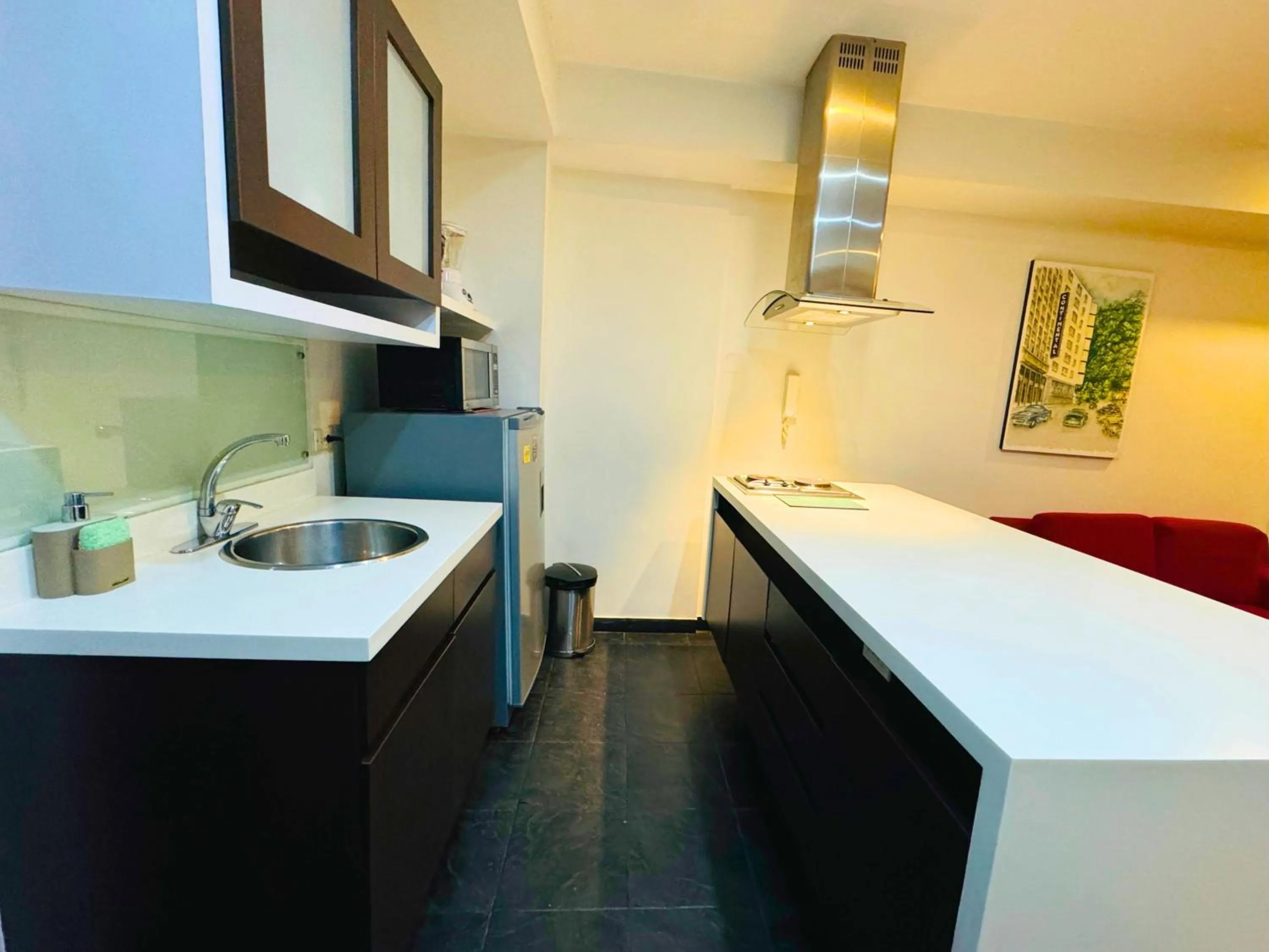 Kitchen or kitchenette in Aparta Suite Continental Bogotá