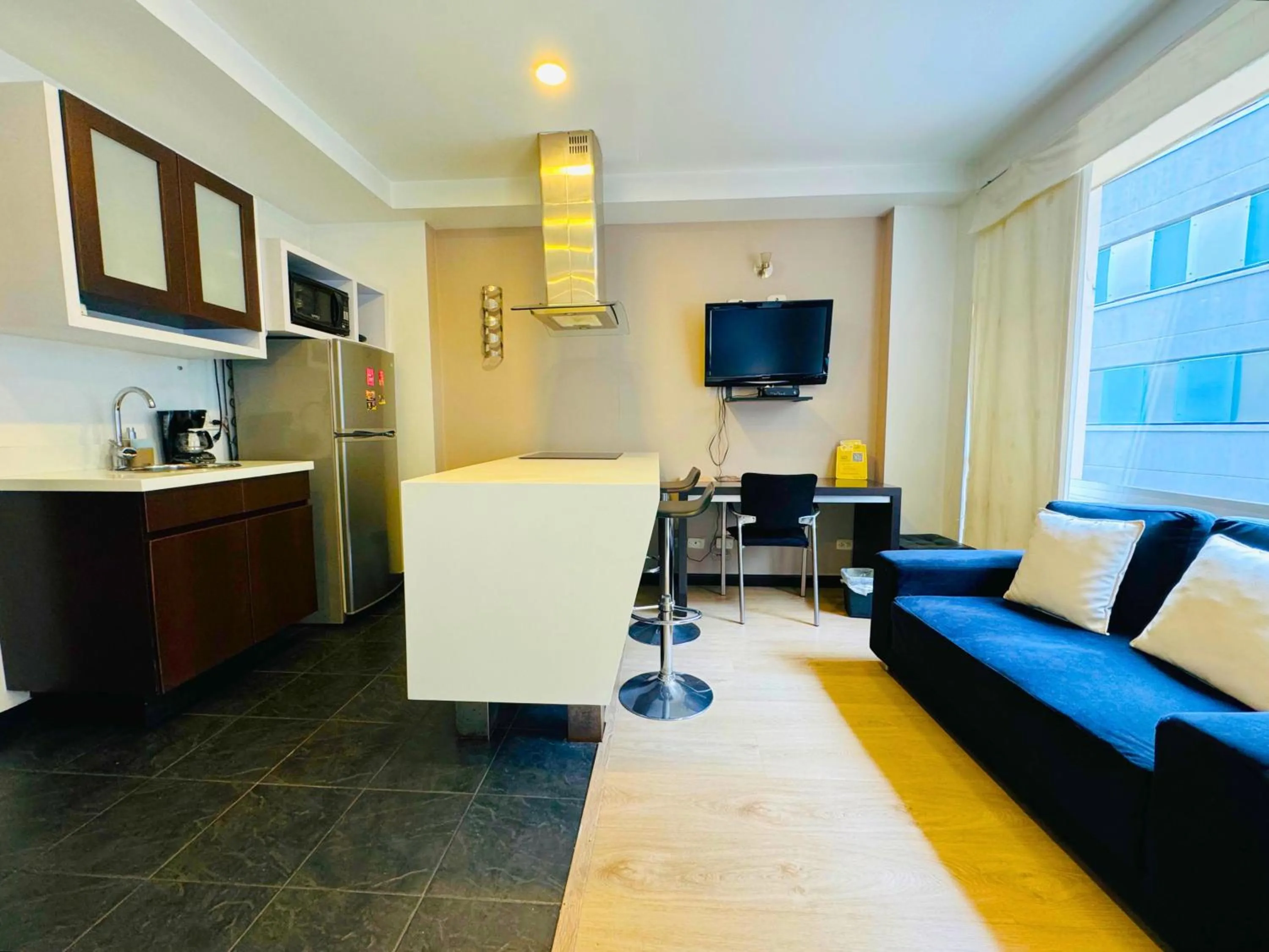 Kitchen or kitchenette in Aparta Suite Continental Bogotá