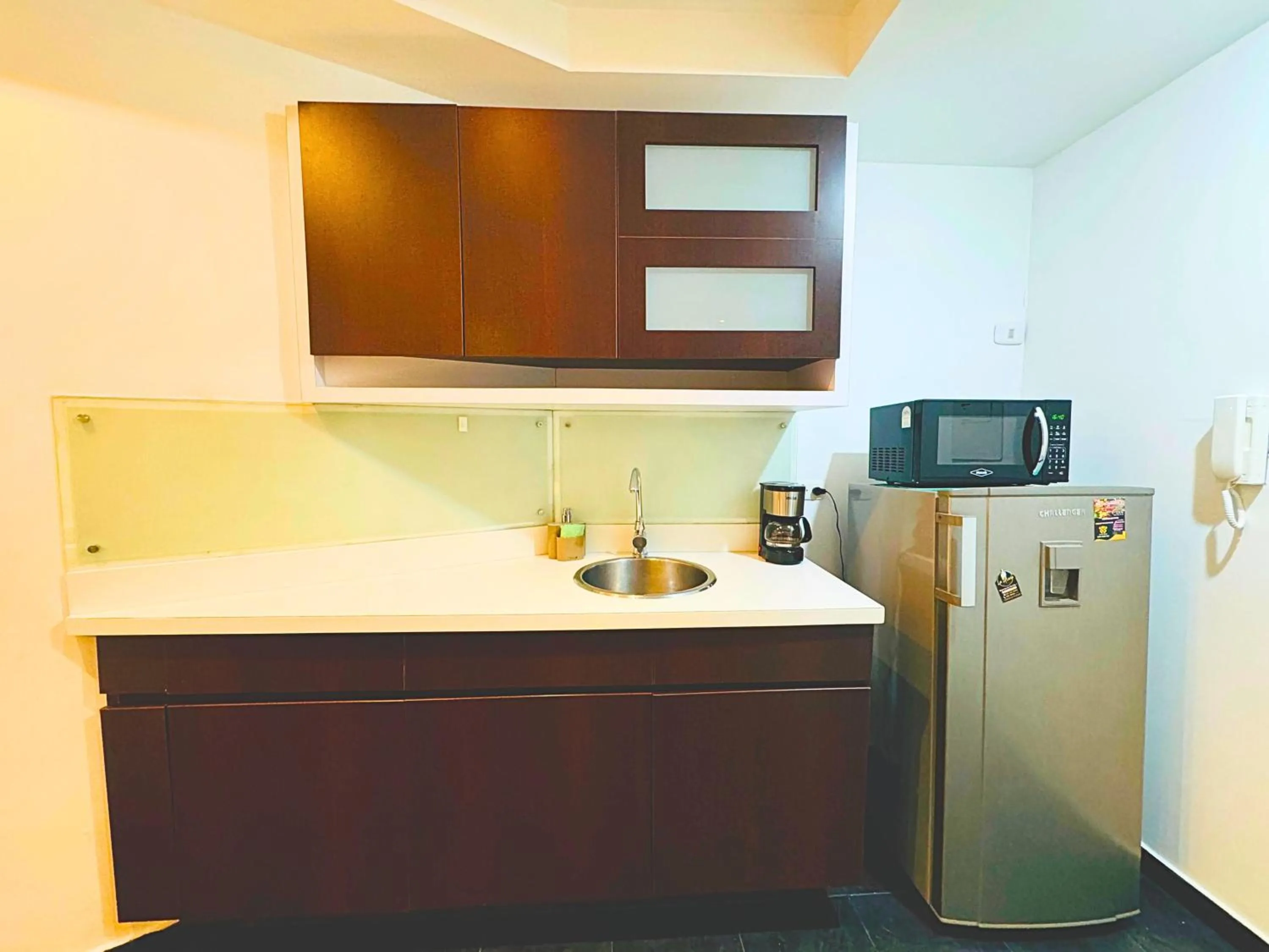 Kitchen or kitchenette in Aparta Suite Continental Bogotá