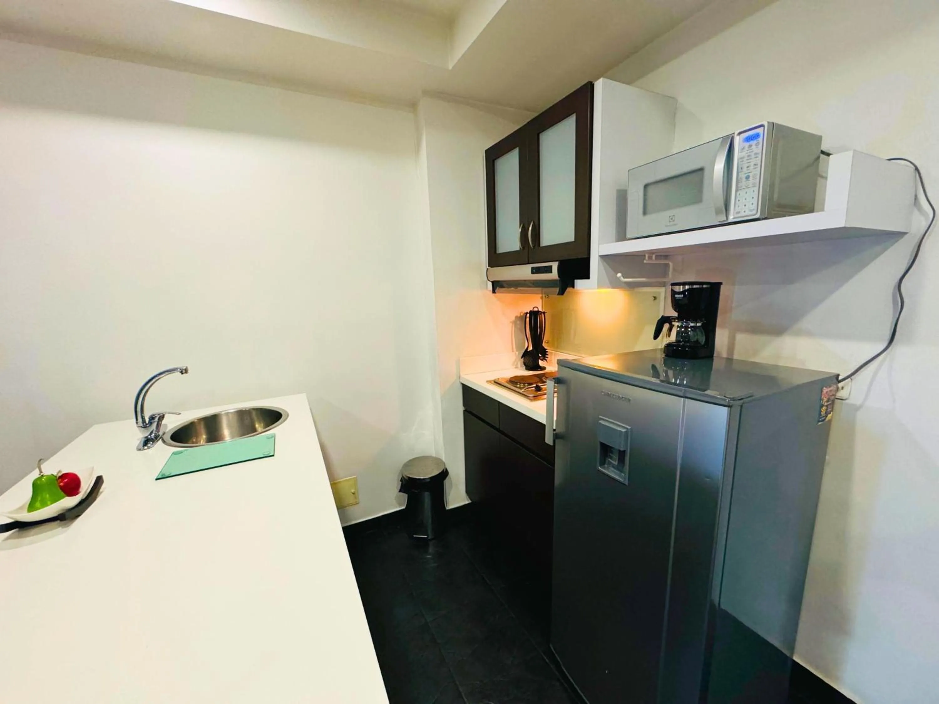 Kitchen or kitchenette in Aparta Suite Continental Bogotá