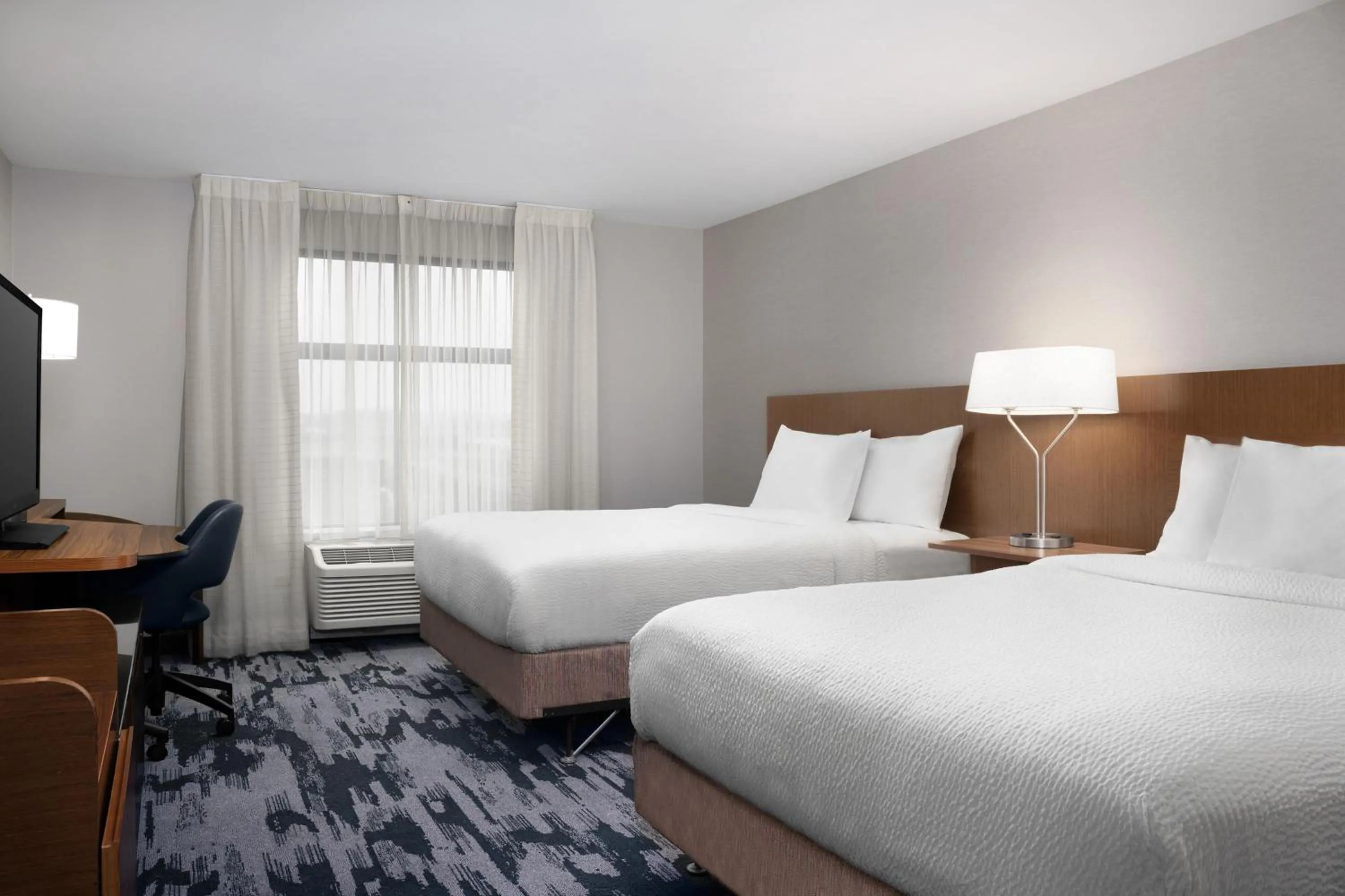 Photo of the whole room, Bed in Fairfield Inn & Suites By Marriott Sioux Falls Airport