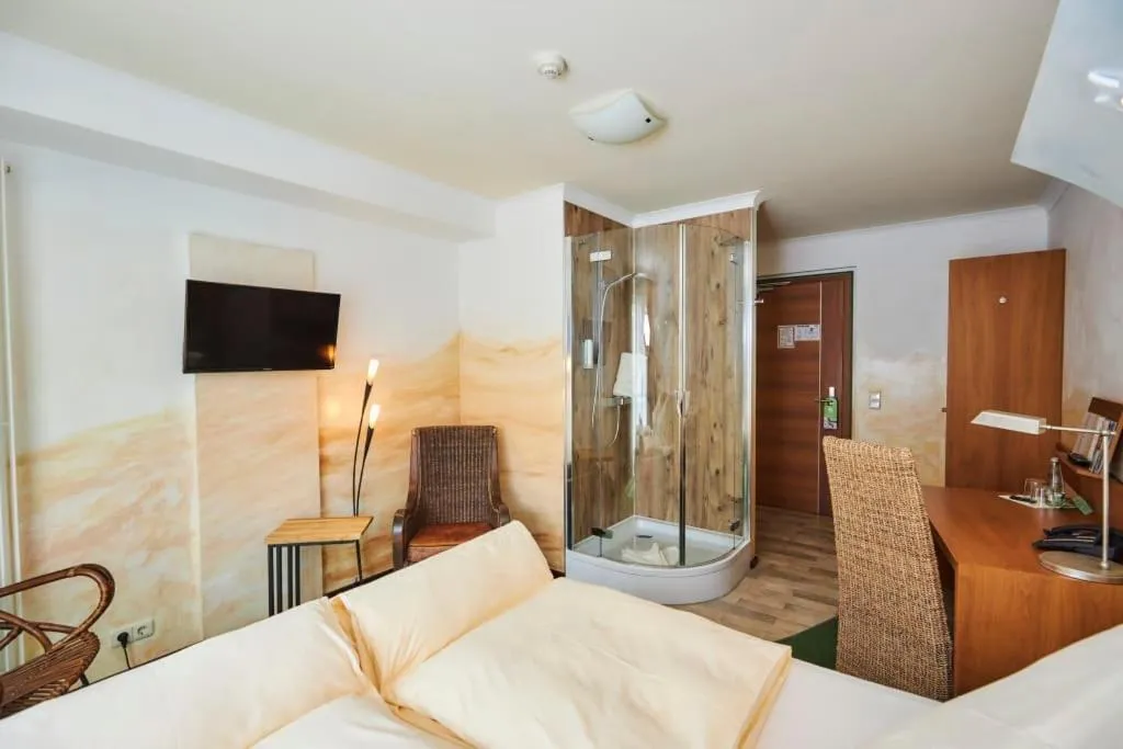 Bed in Flair Hotel Zum Schwarzen Reiter