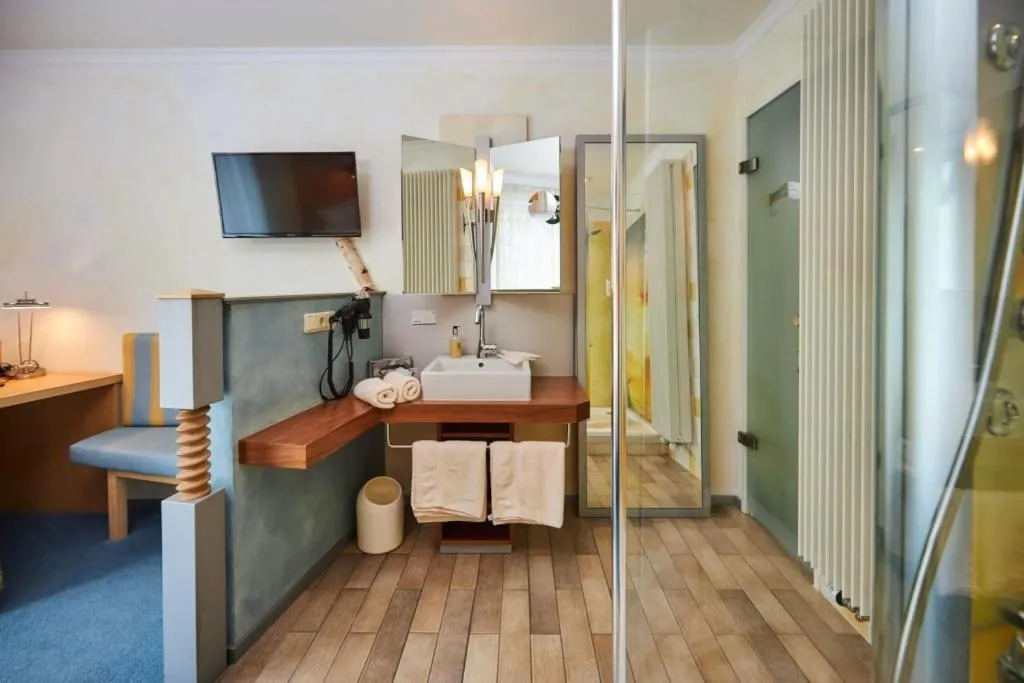 Bed in Flair Hotel Zum Schwarzen Reiter