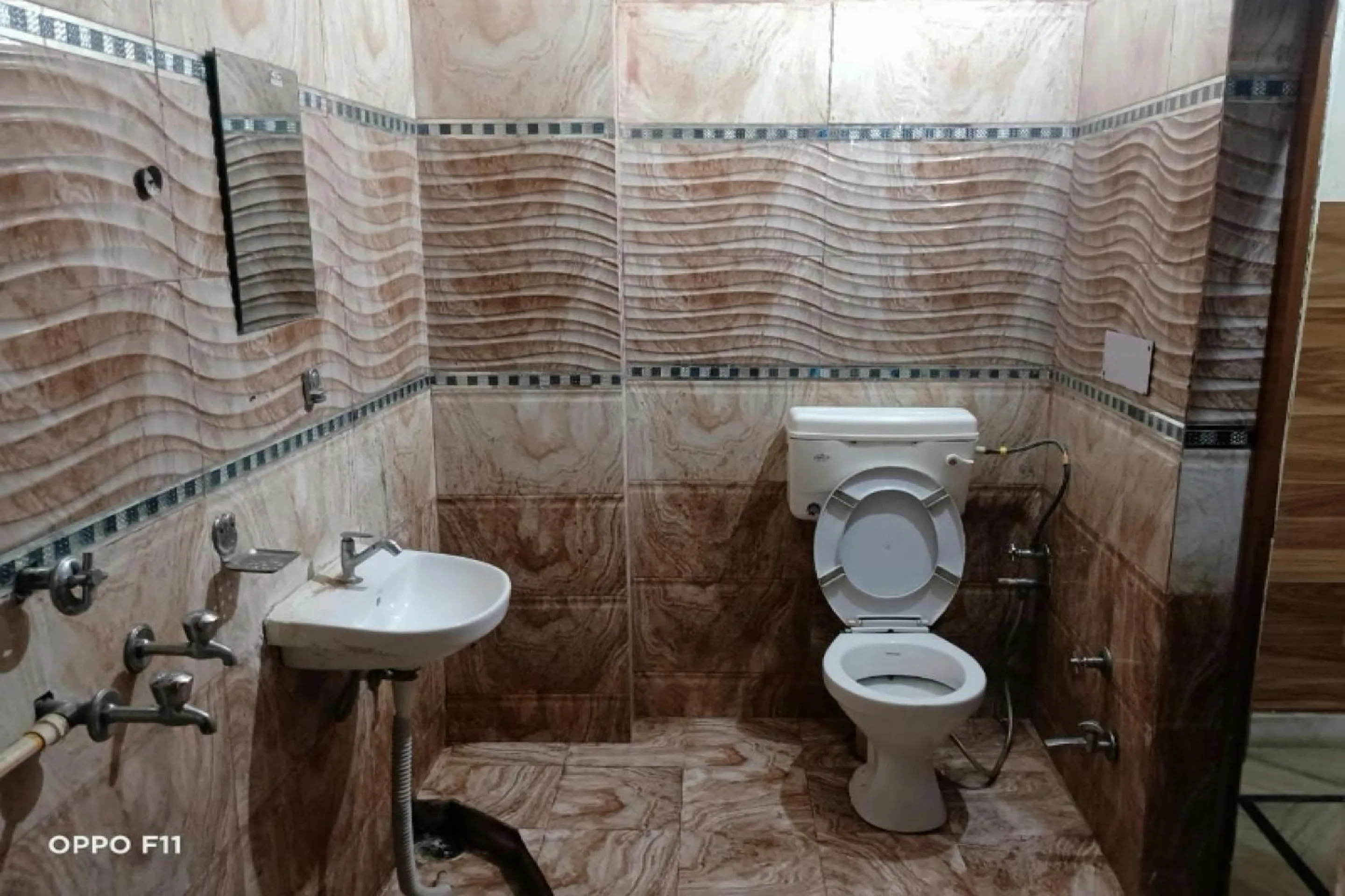Bathroom in SPOT ON Hotel Abhinandan
