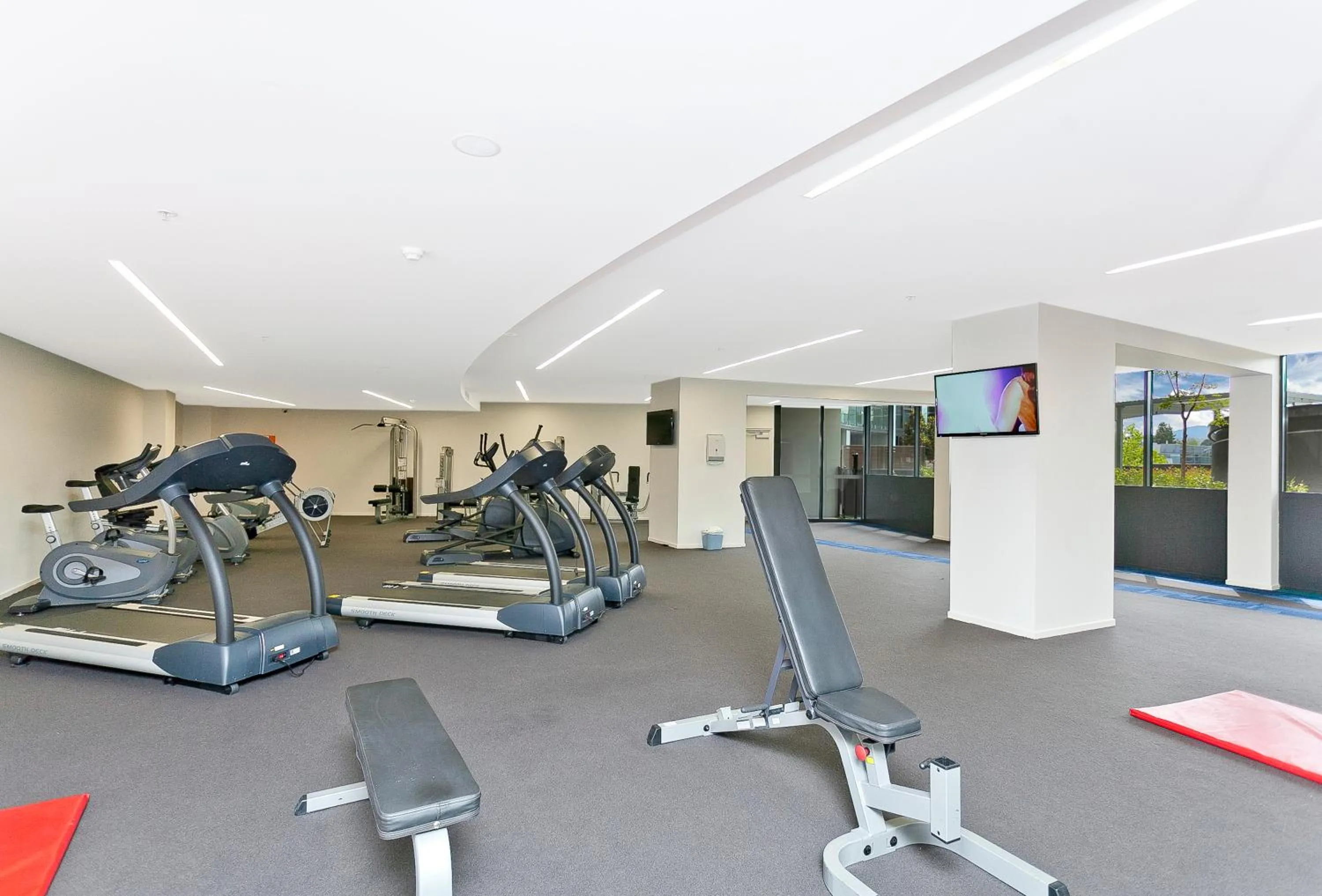 Fitness centre/facilities in AAC Apartments - Manhattan