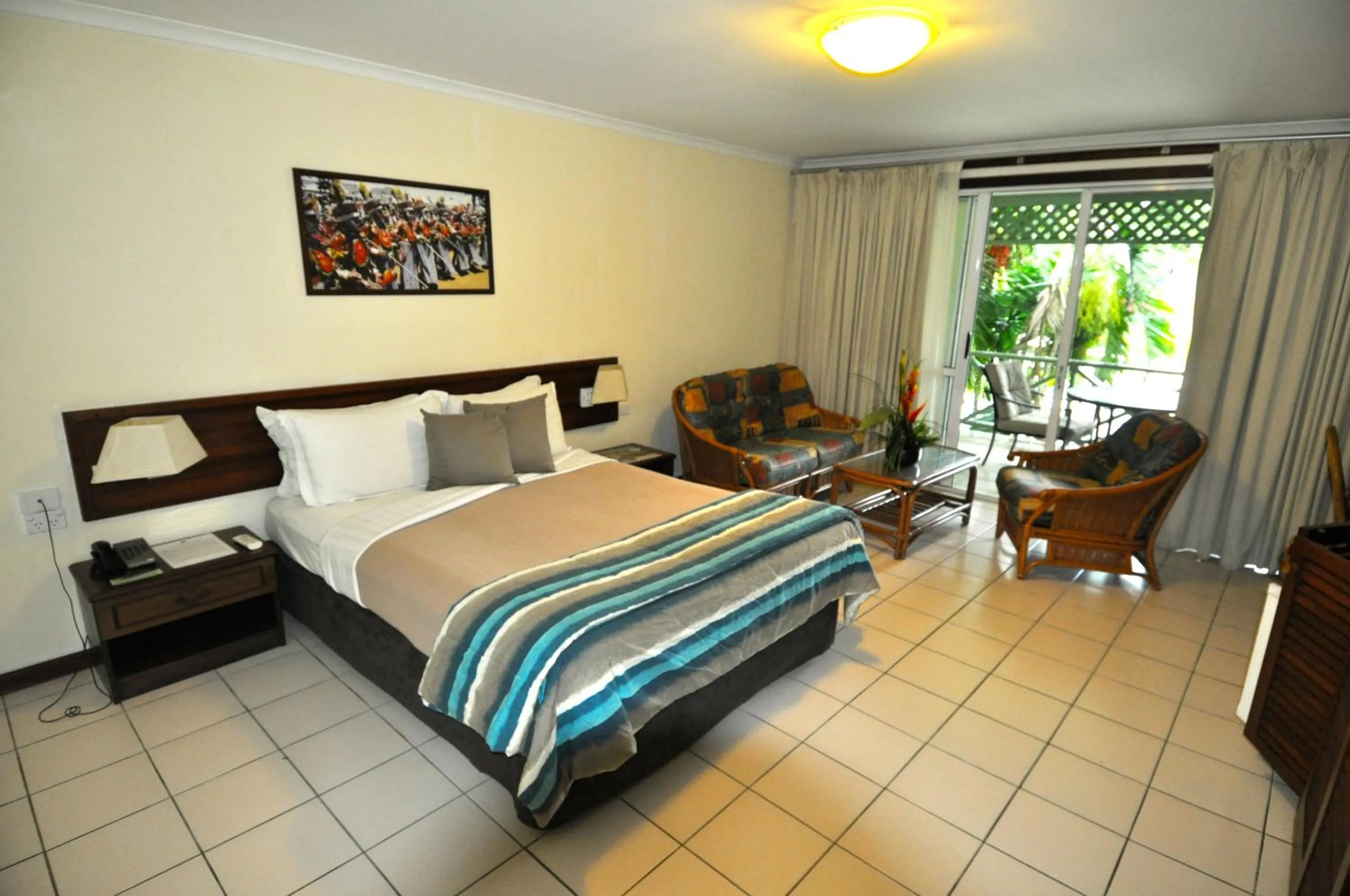Living room, Bed in Madang Resort