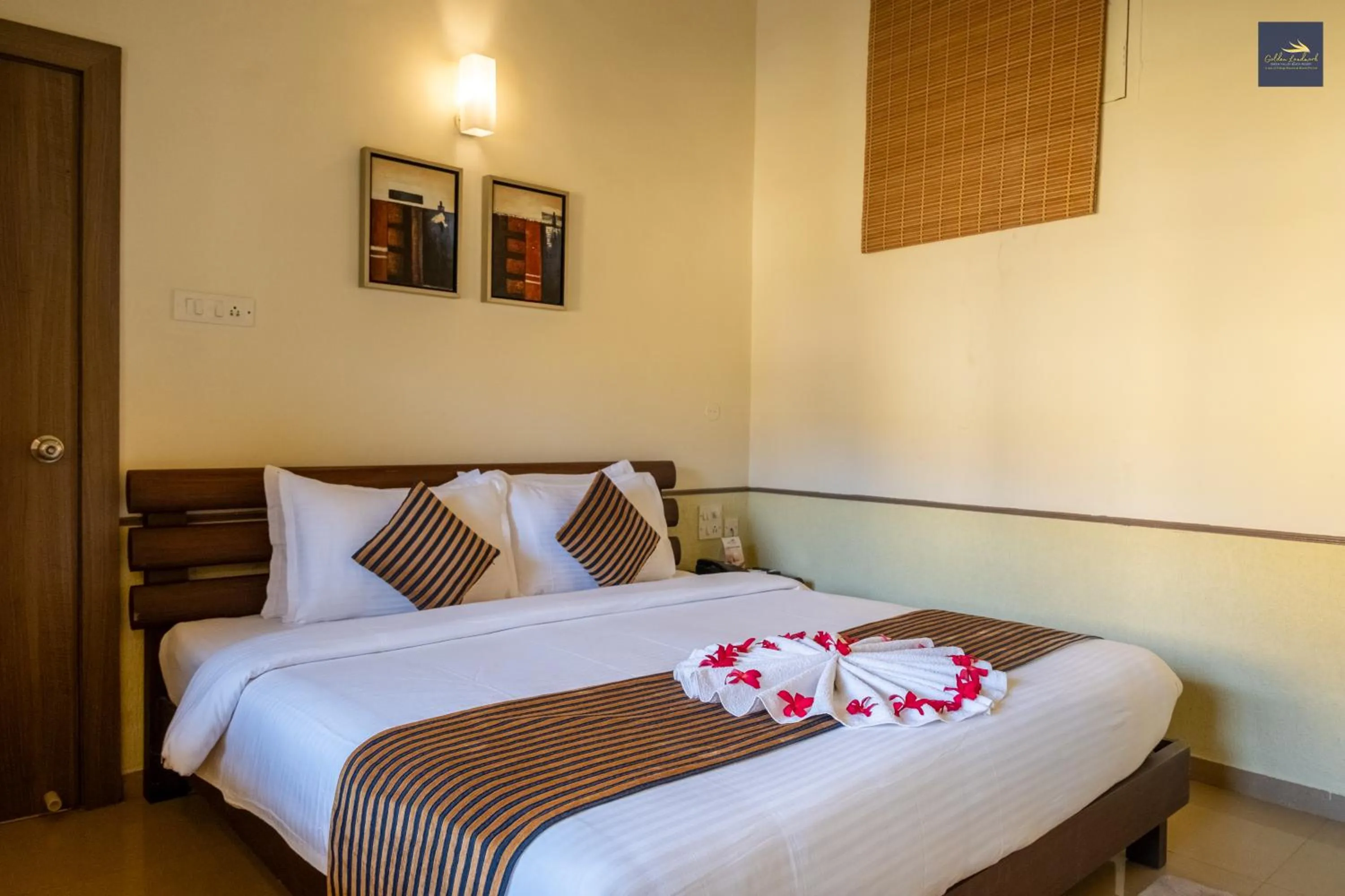 Bed in Golden Landmark Green Valley Beach Resort