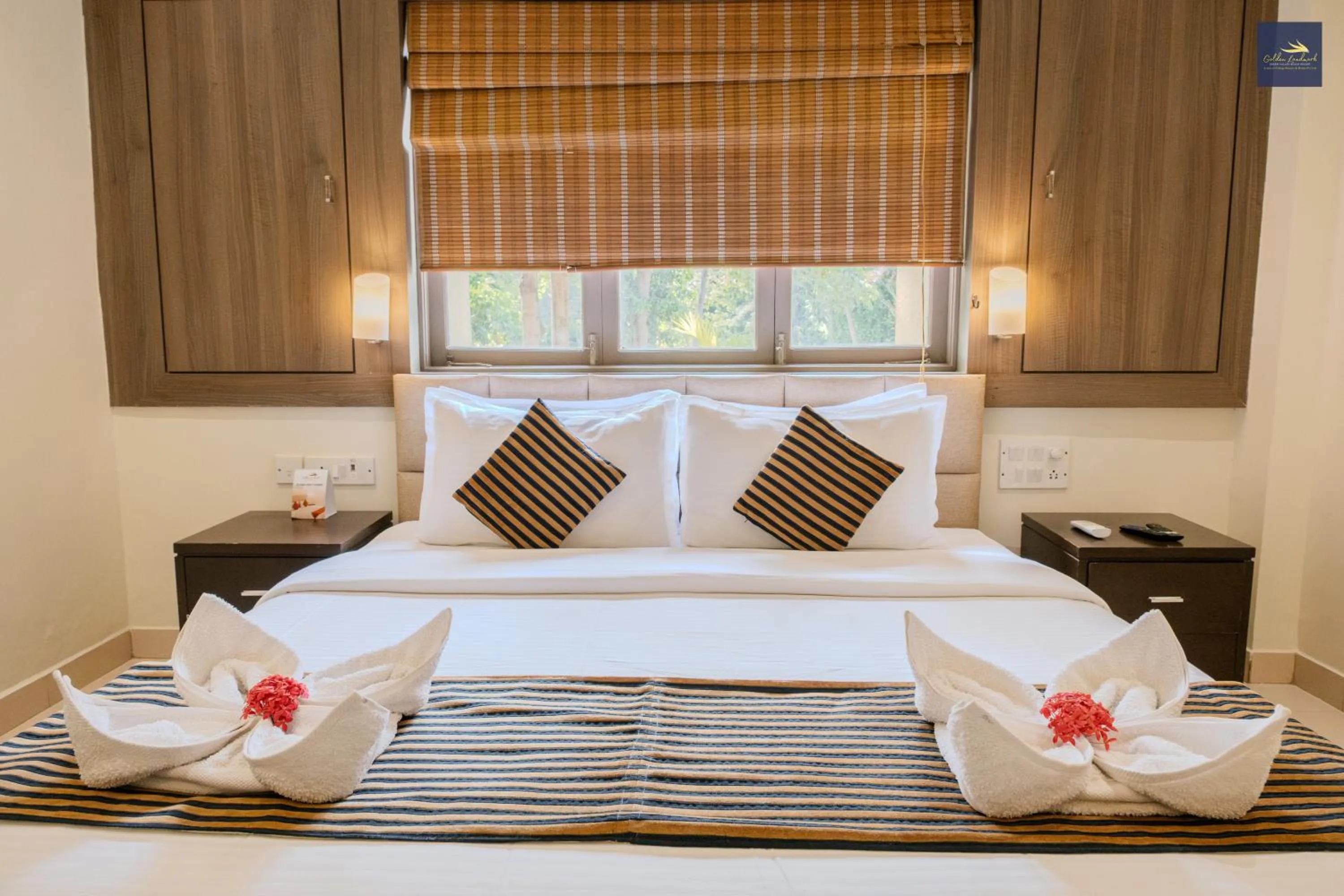 Bed in Golden Landmark Green Valley Beach Resort