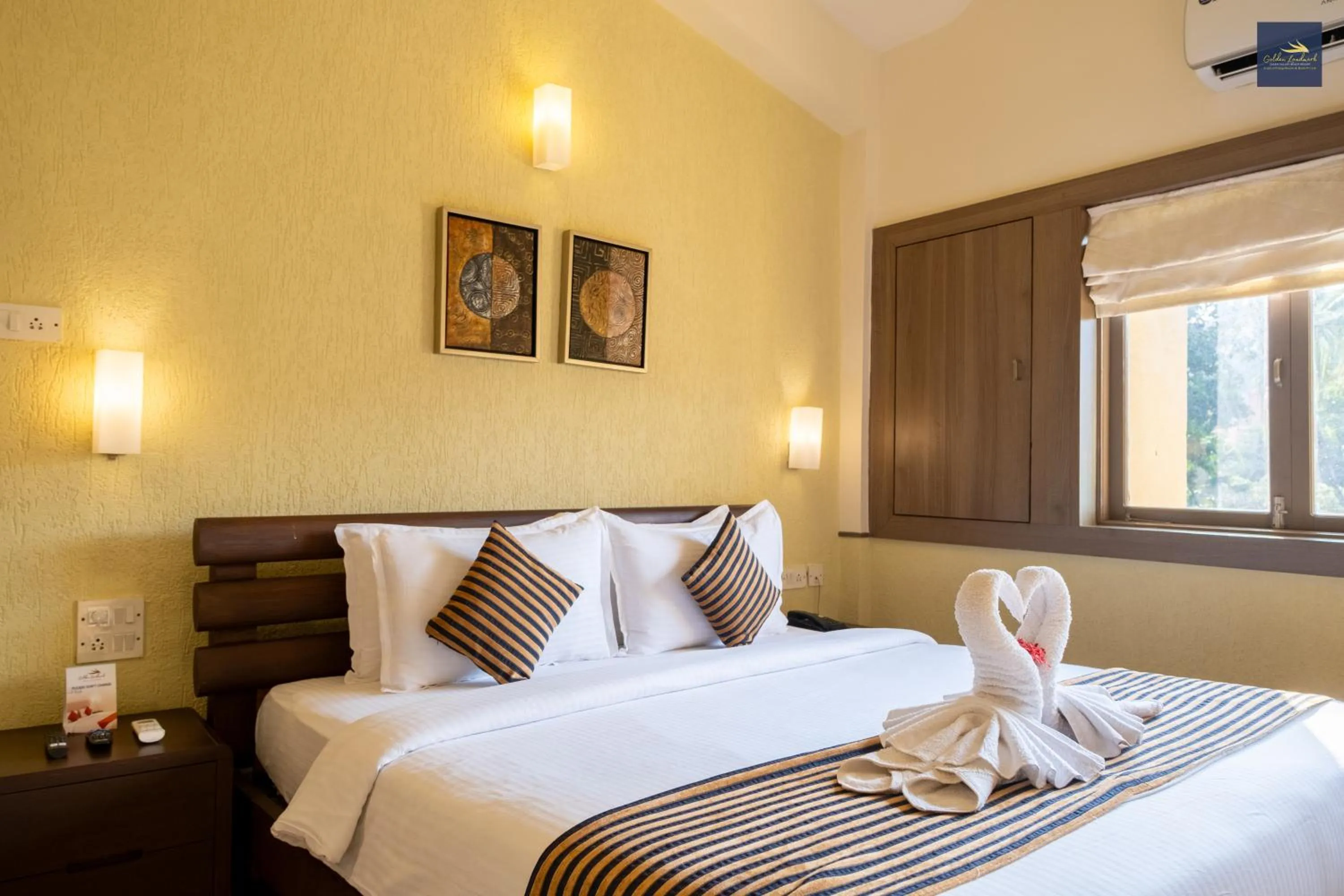 Bed in Golden Landmark Green Valley Beach Resort