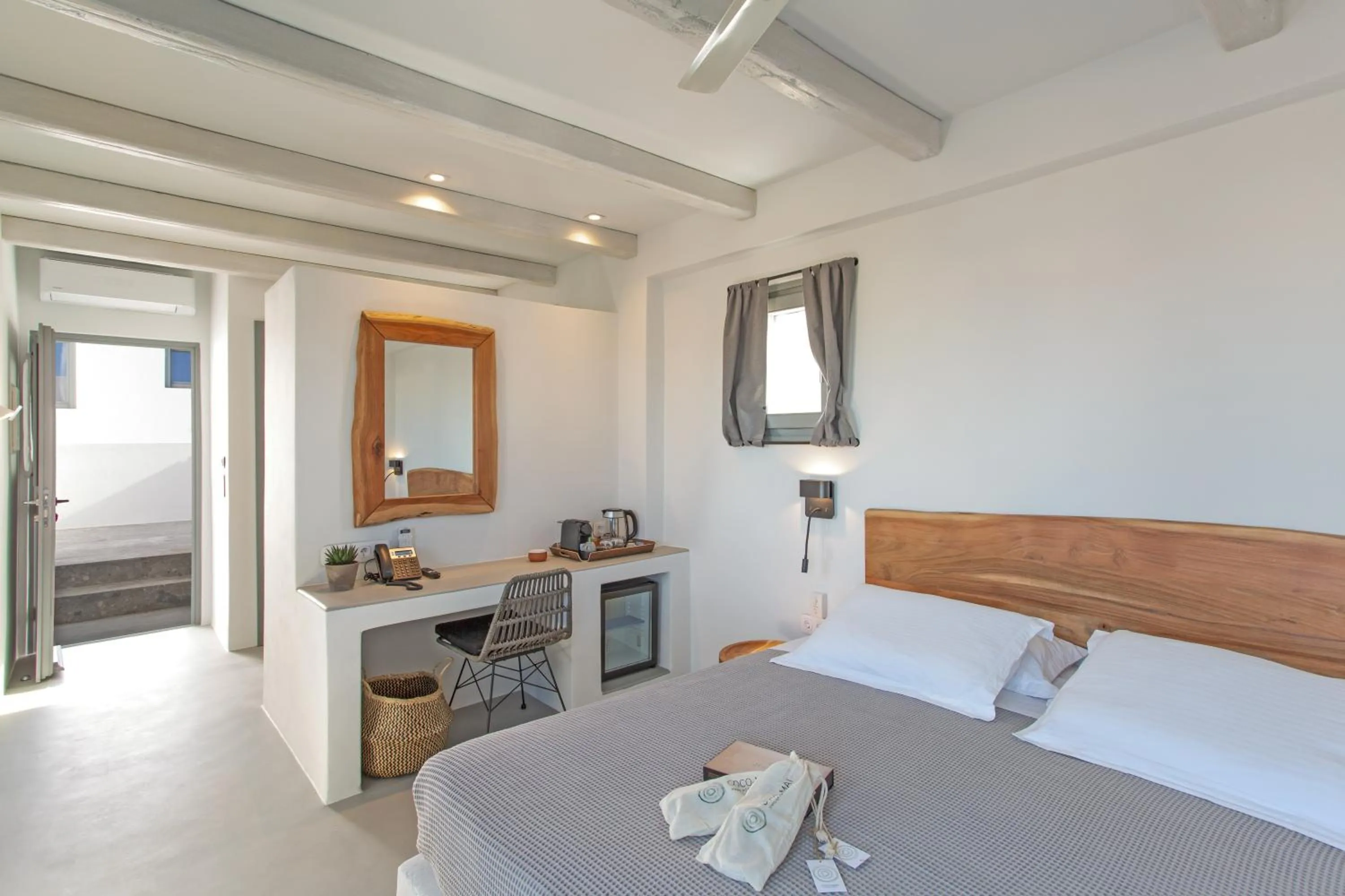 Bed in Paros Cape Suites