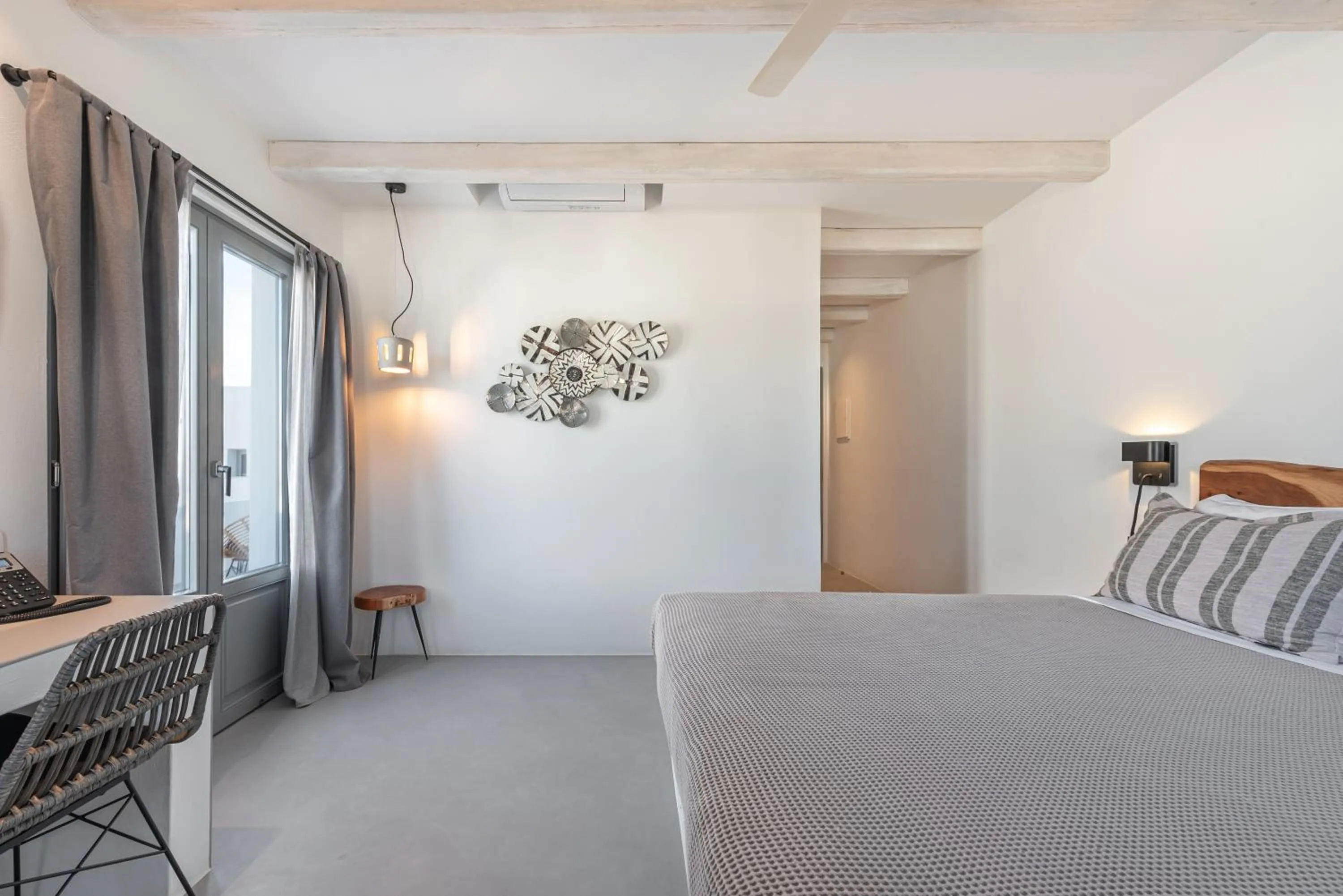 Bed in Paros Cape Suites