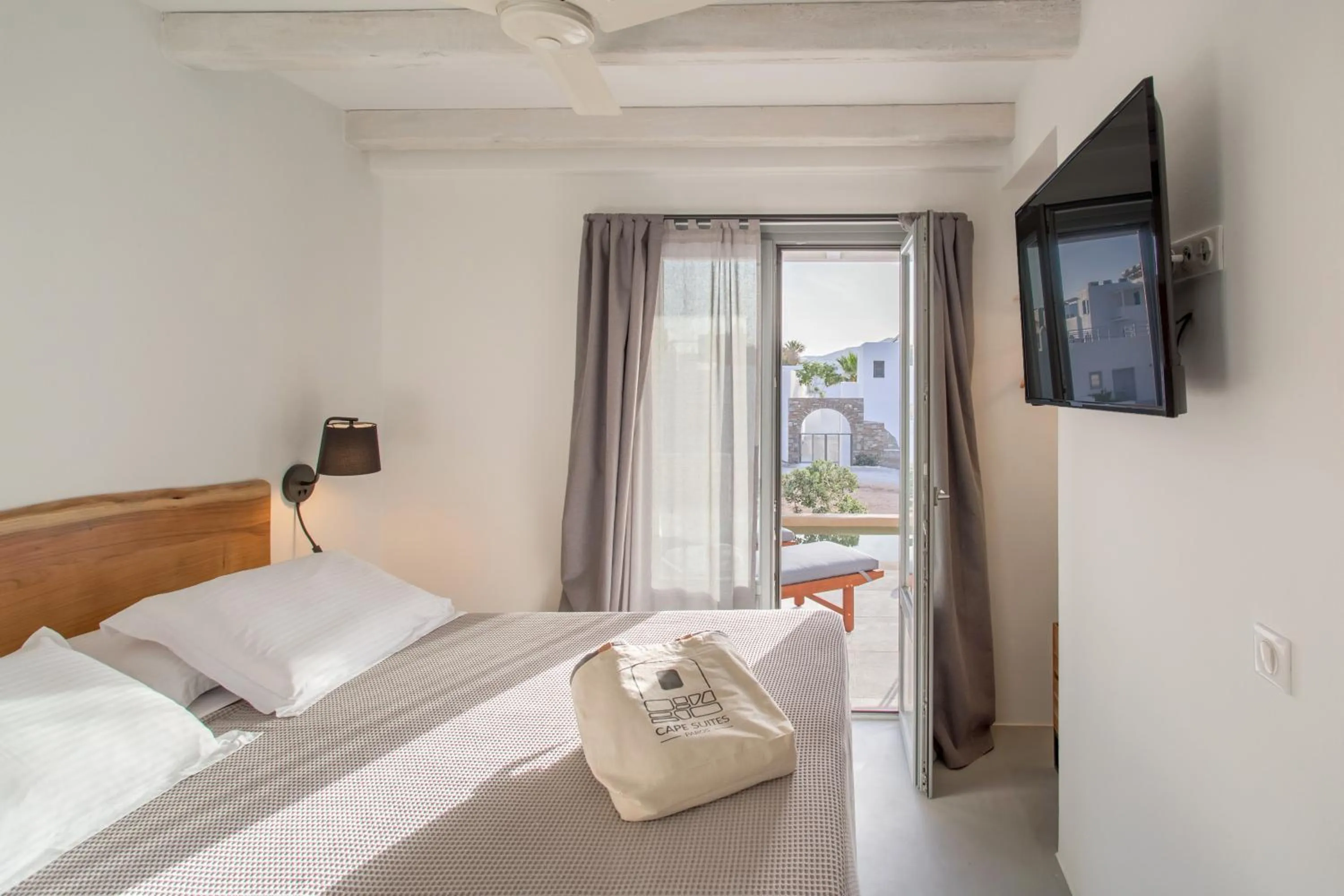 Bed in Paros Cape Suites