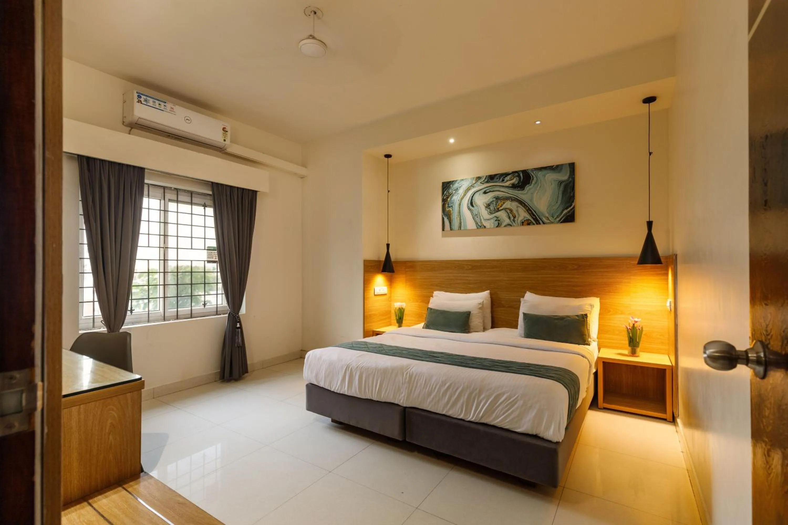 Bed in Eiffel Suites - Kammanahalli