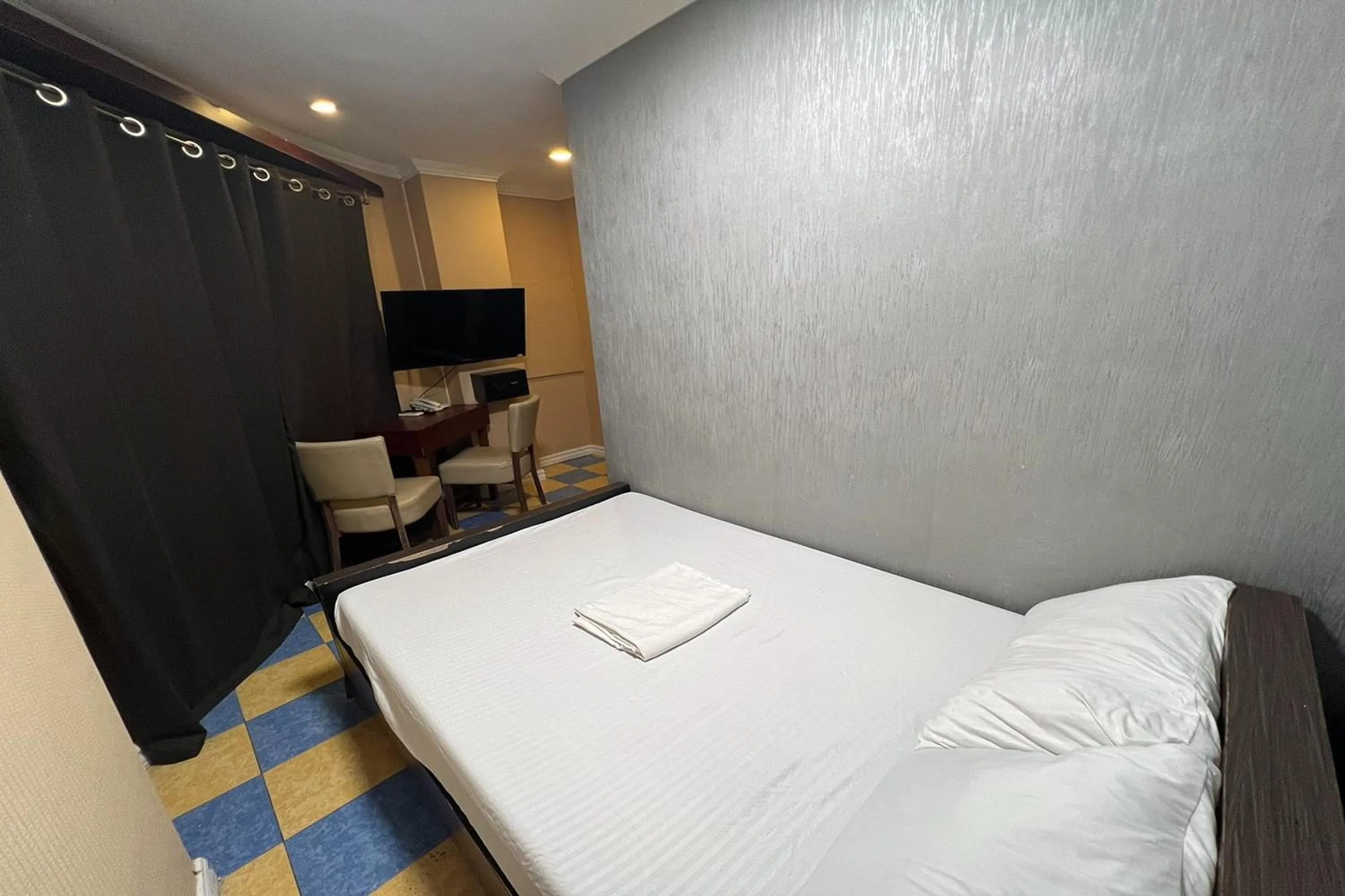 Bed in Remedios Hotel Manila City Center