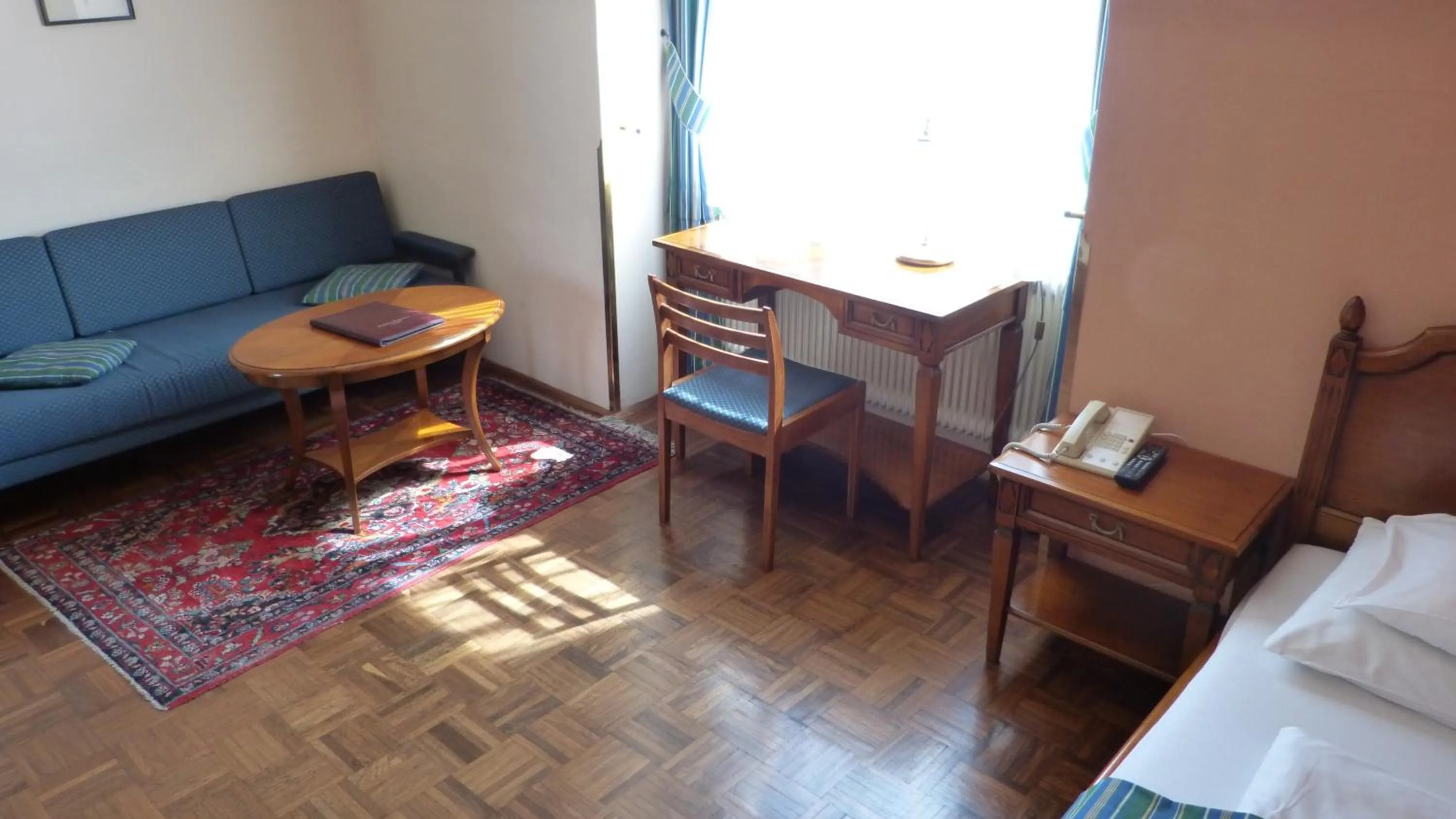 Seating area, Bed in Hotel Apartment Rothensteiner