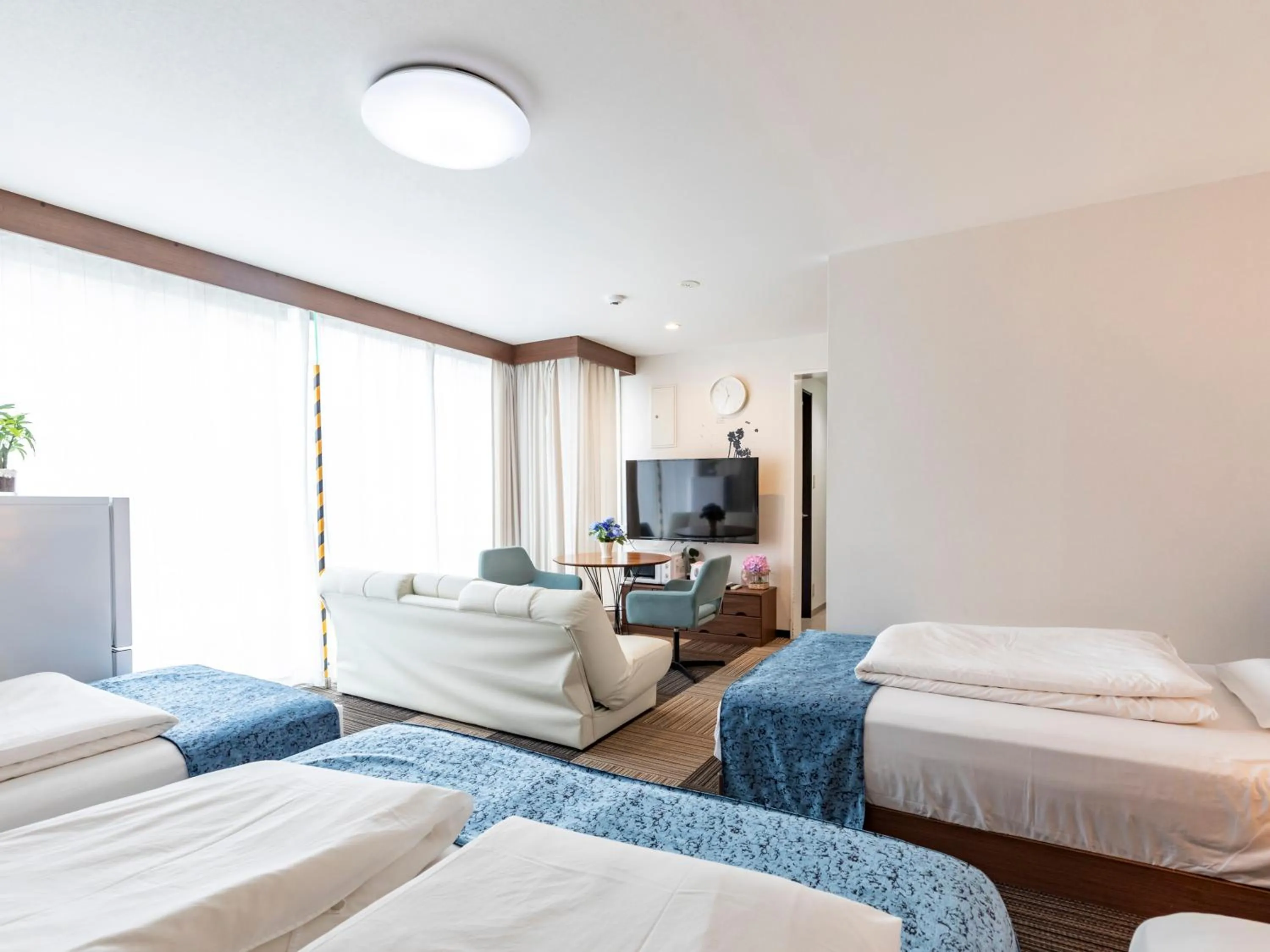 Bed in Tabist Sakuragawa River Side Hotel