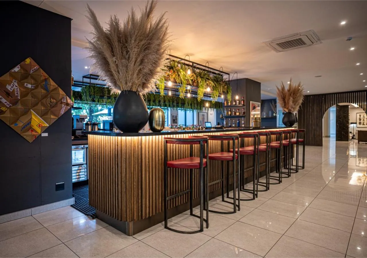 Lounge or bar in The Catalyst Apartment Hotel by NEWMARK