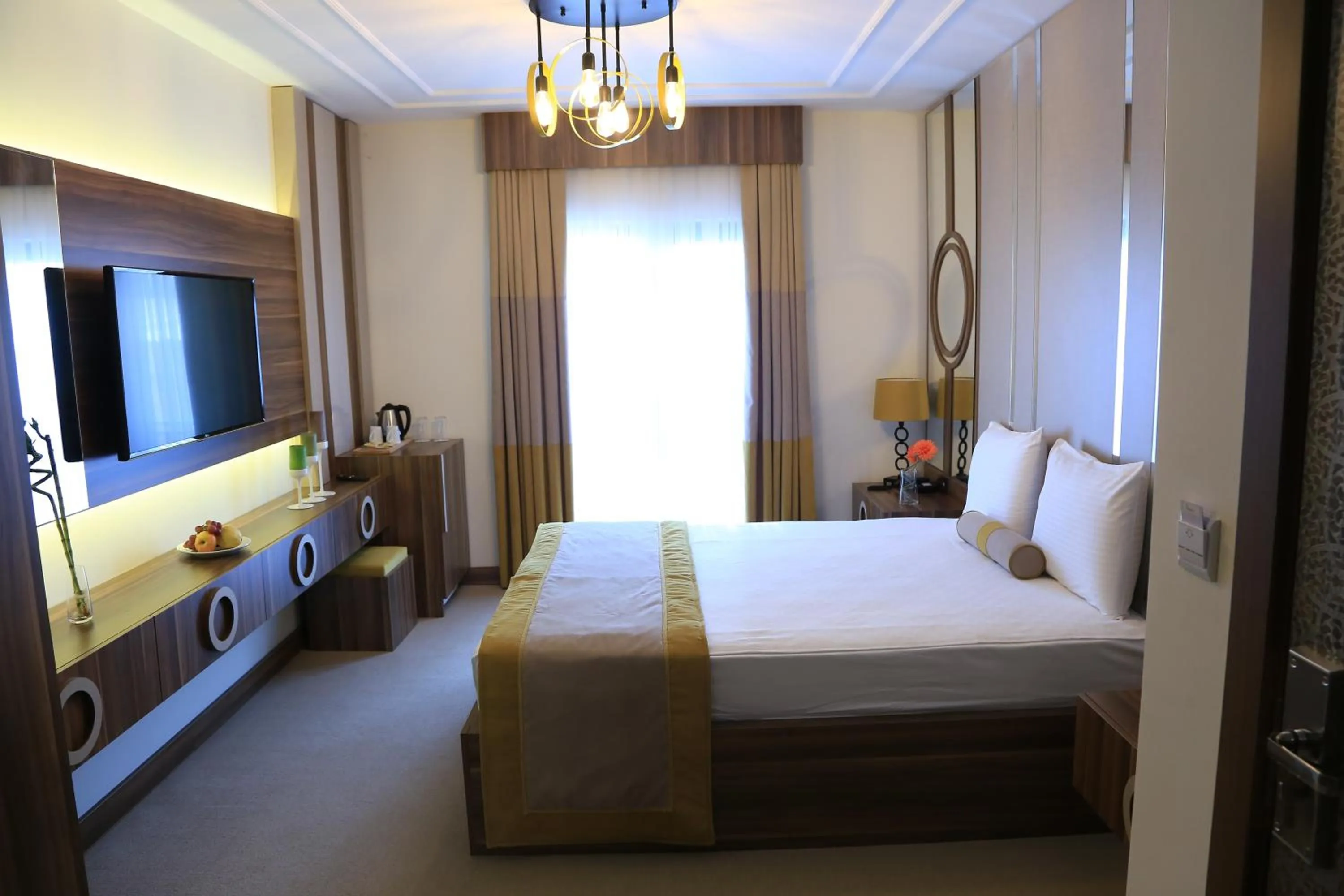 Communal lounge/ TV room, Bed in Burçman Hotel Vişne