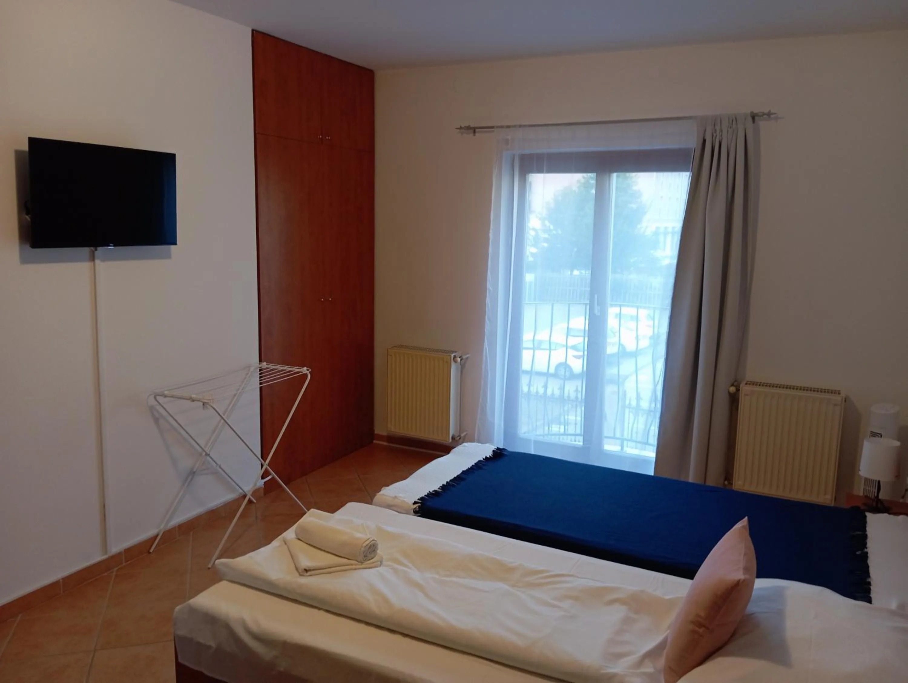 Bed in Szent Kristóf Apartmanhotel