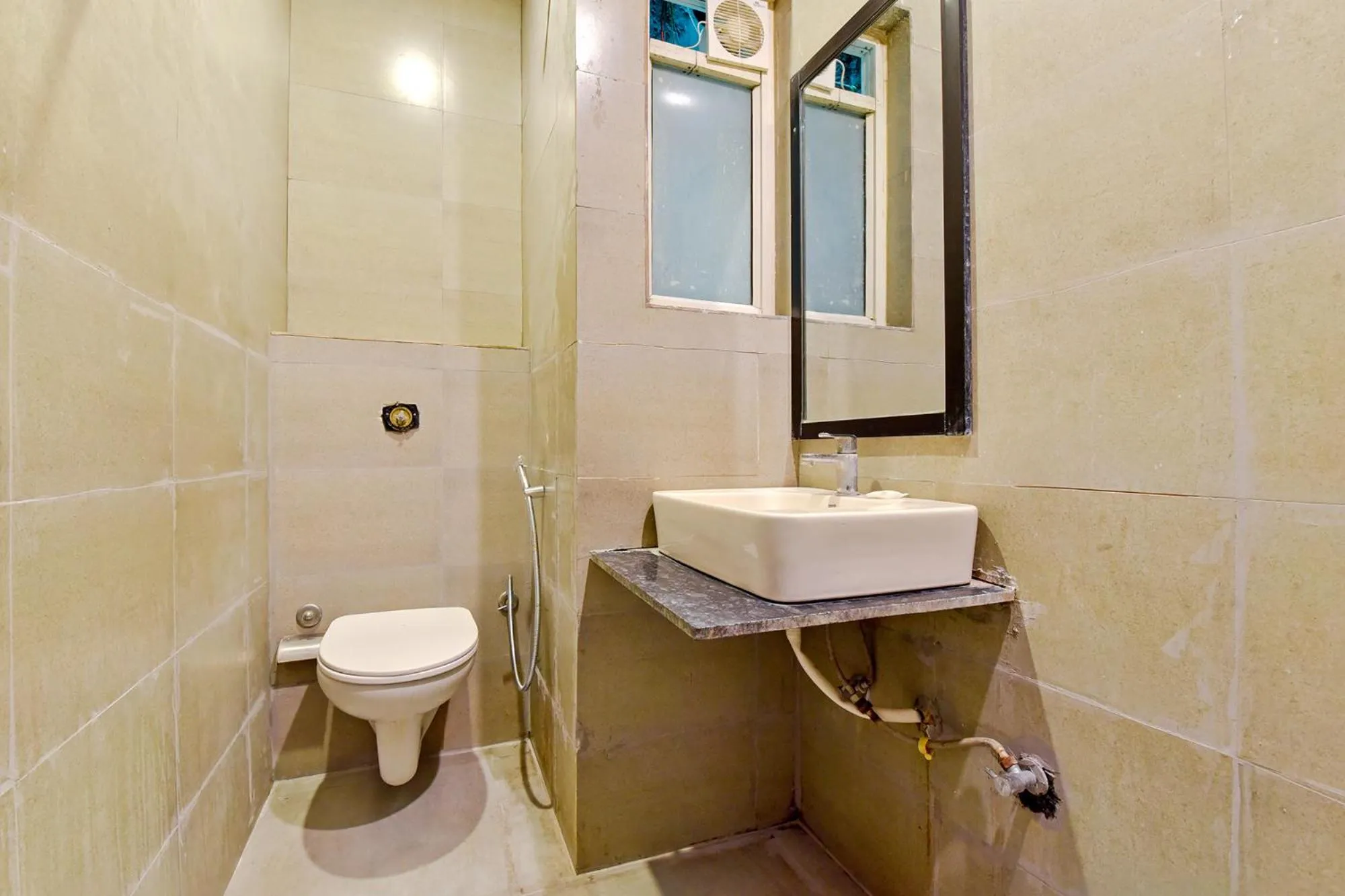 Bathroom in OYO 79651 TownHouse OTH Buddhi