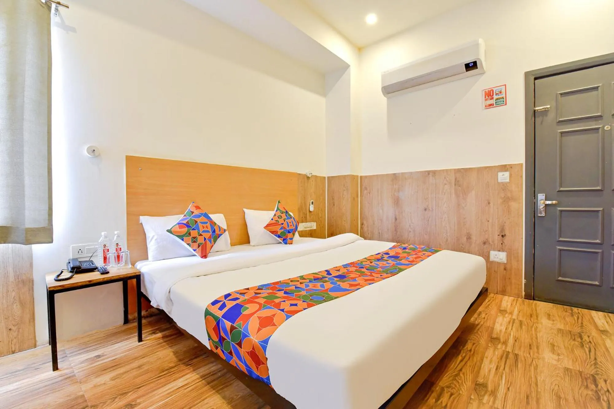 Bed in OYO 79651 TownHouse OTH Buddhi