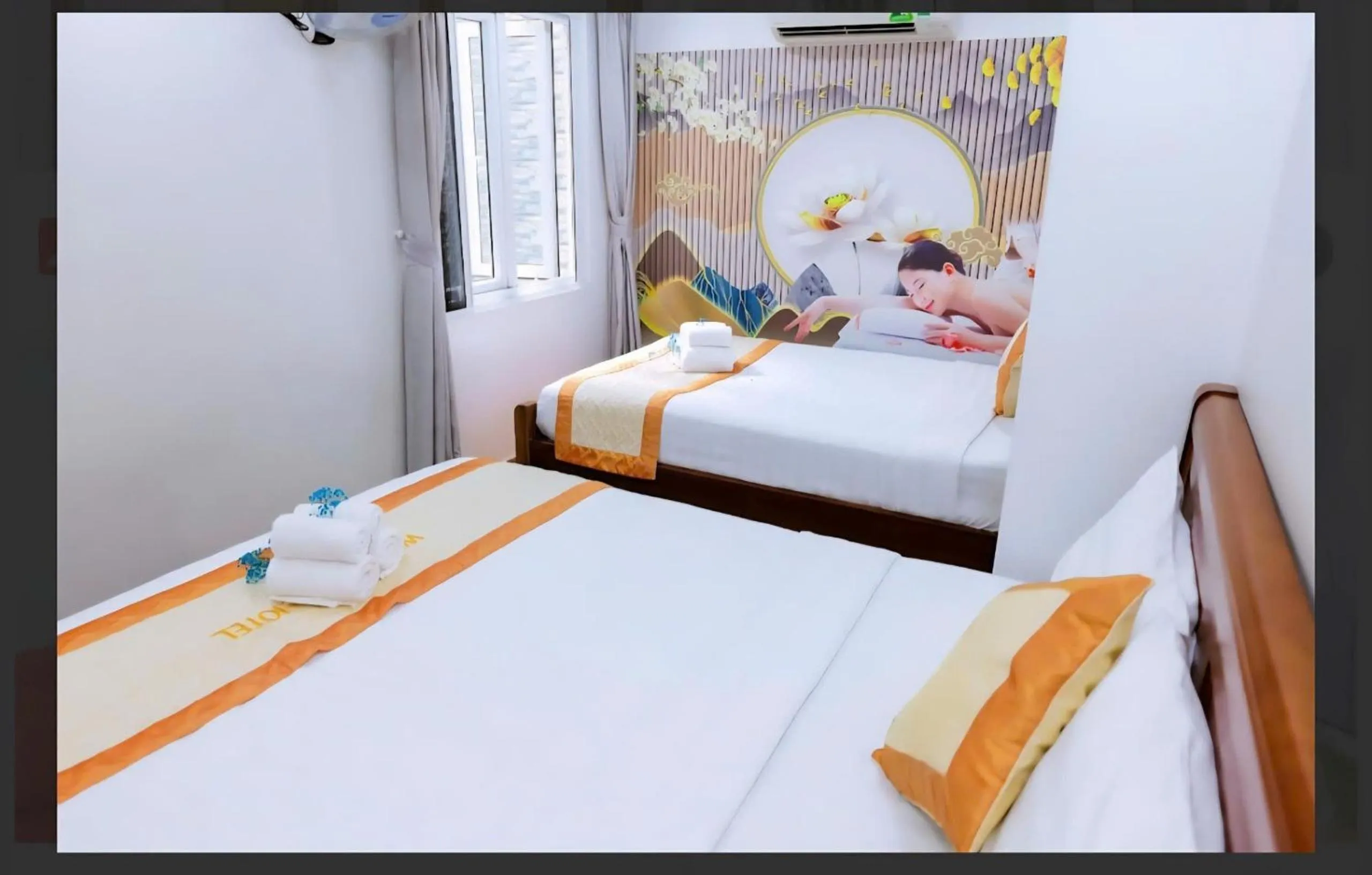 Bed in Genie Hotel & Serviced Apartments
