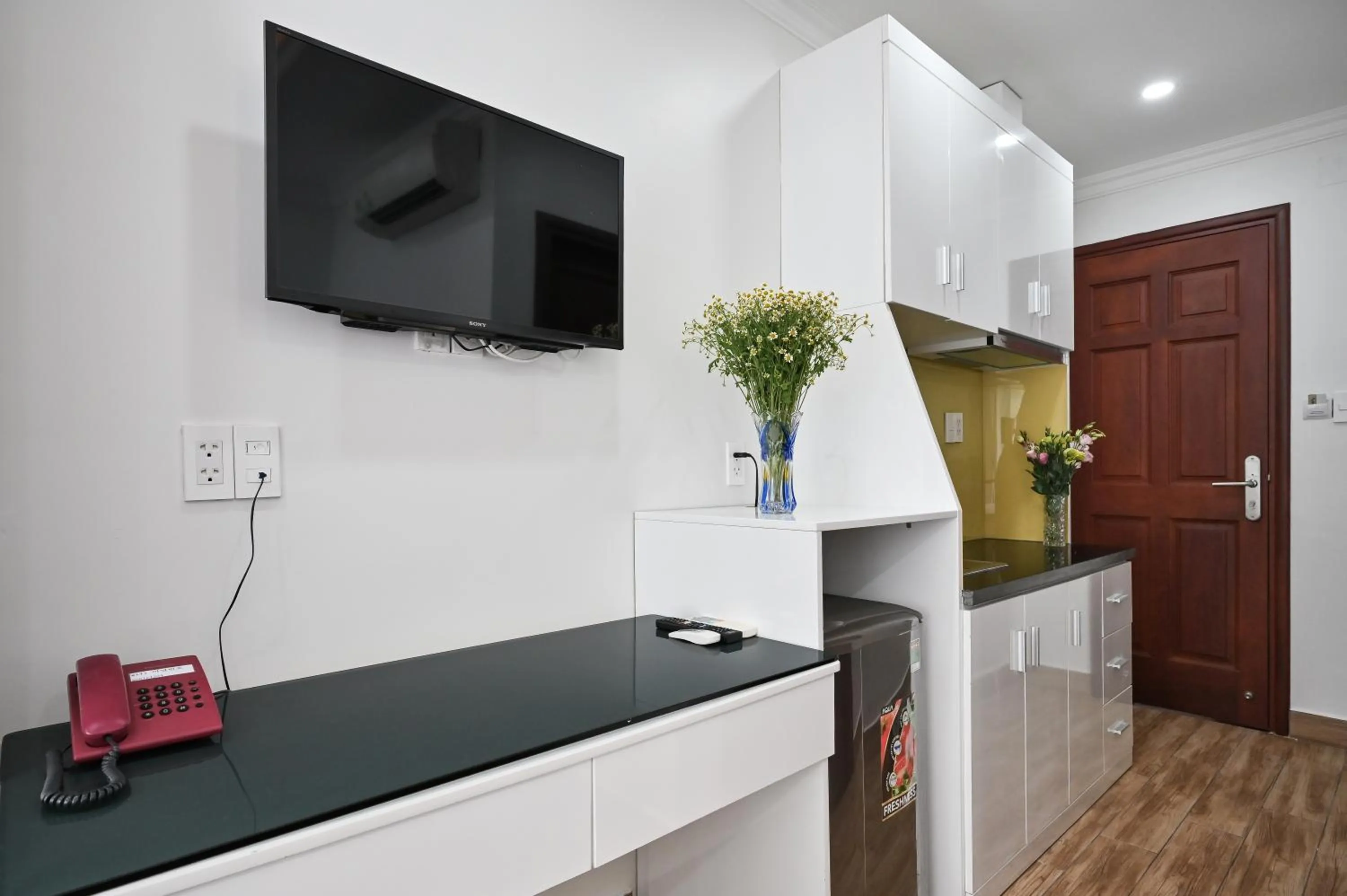 Kitchen or kitchenette in Genie Hotel & Serviced Apartments