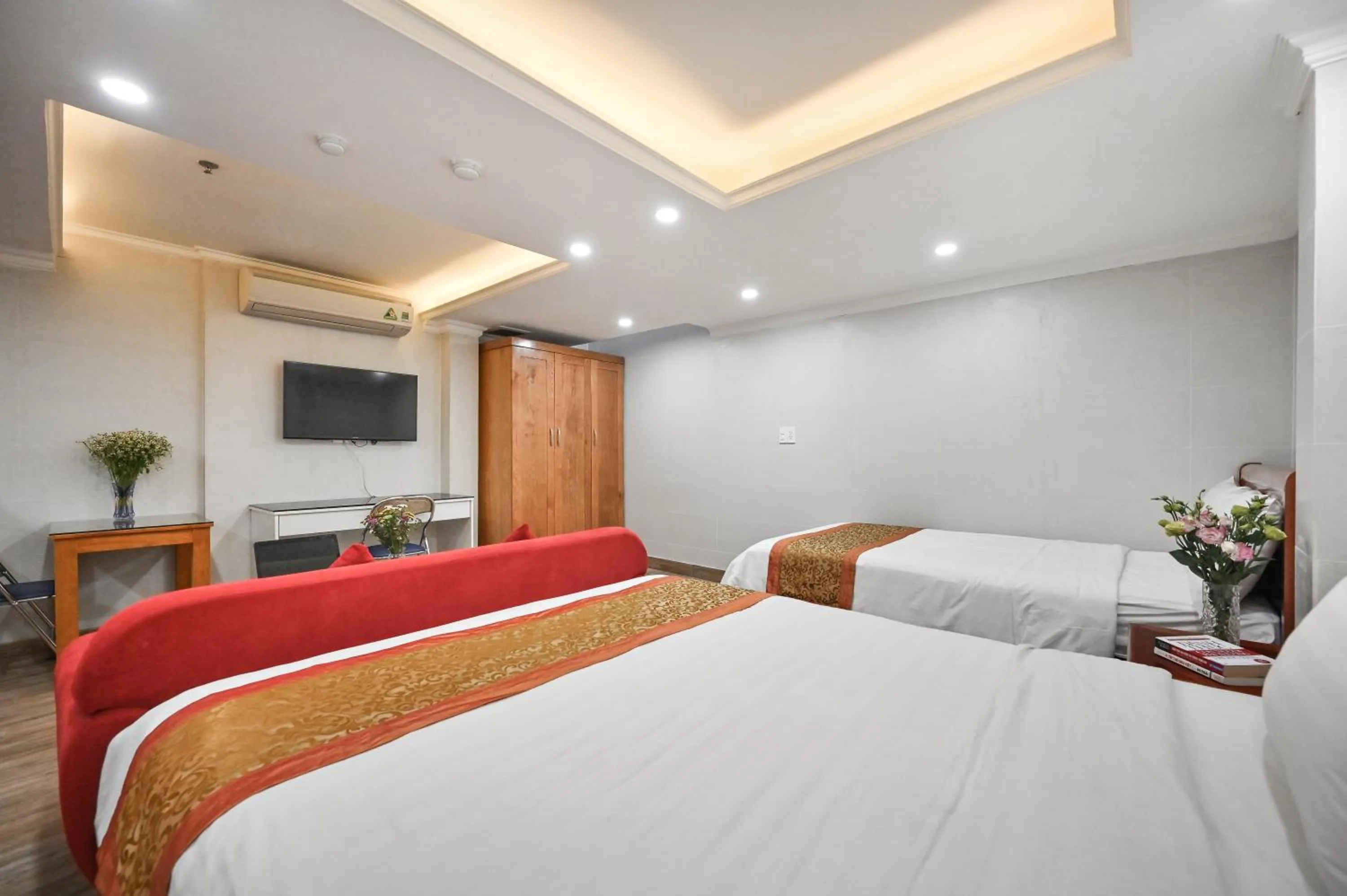 Bed in Genie Hotel & Serviced Apartments