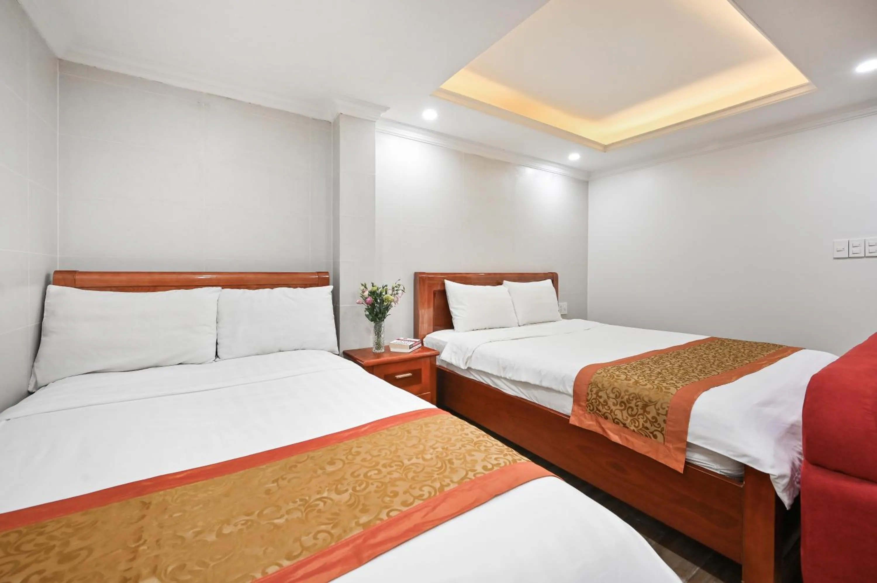 Photo of the whole room, Bed in Genie Hotel & Serviced Apartments