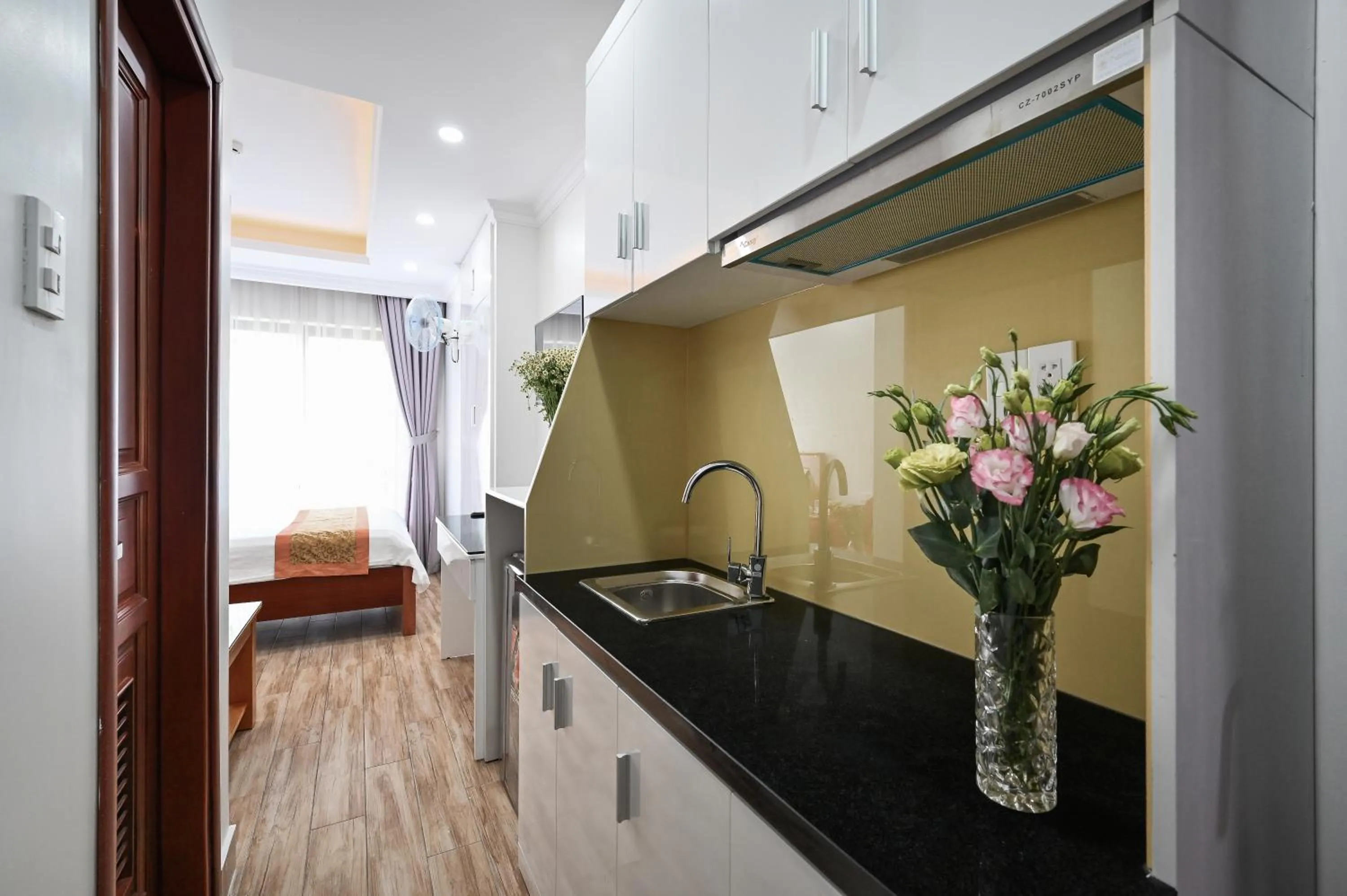 Kitchen or kitchenette in Genie Hotel & Serviced Apartments