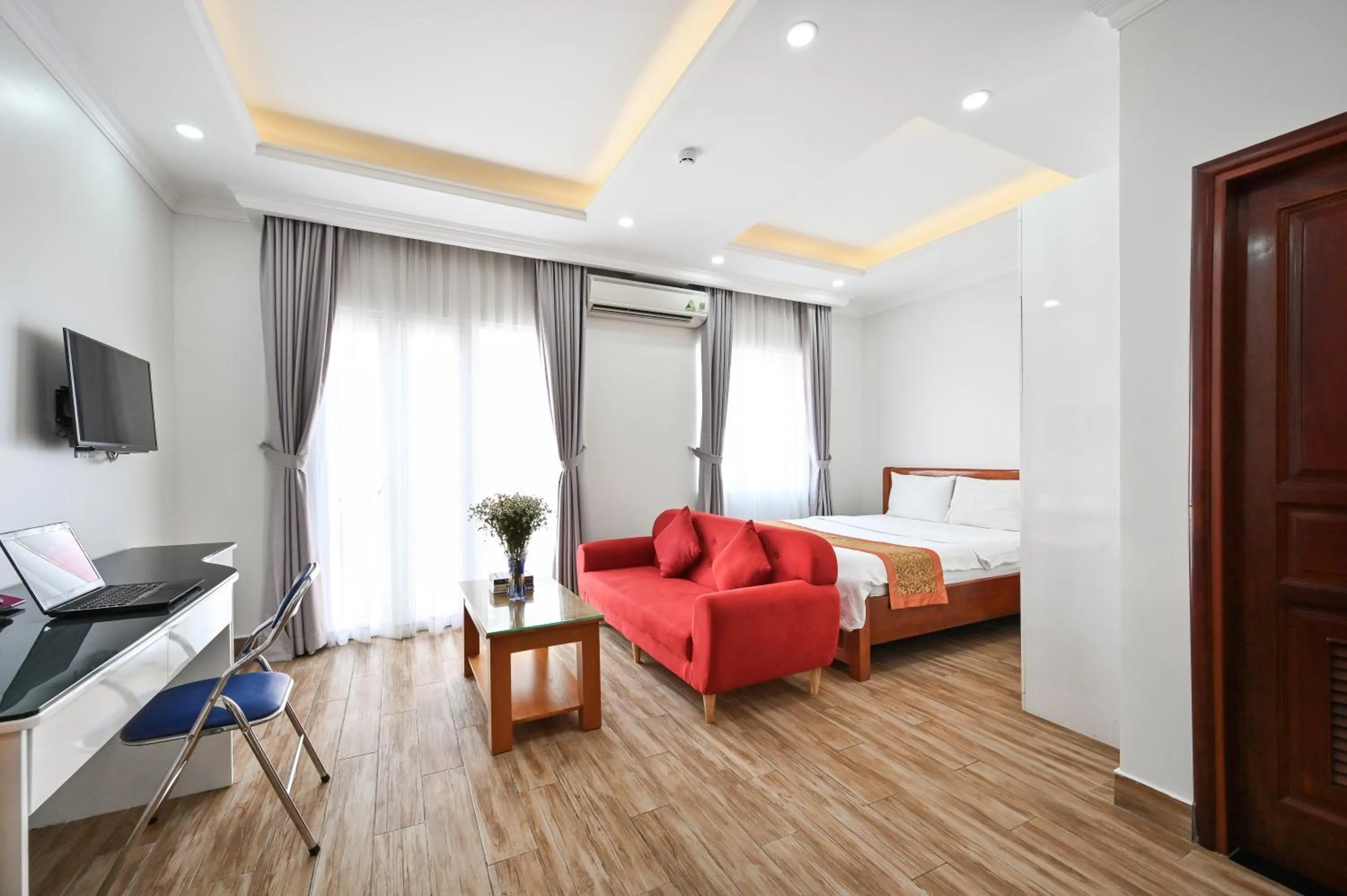 Living room, Bed in Genie Hotel & Serviced Apartments