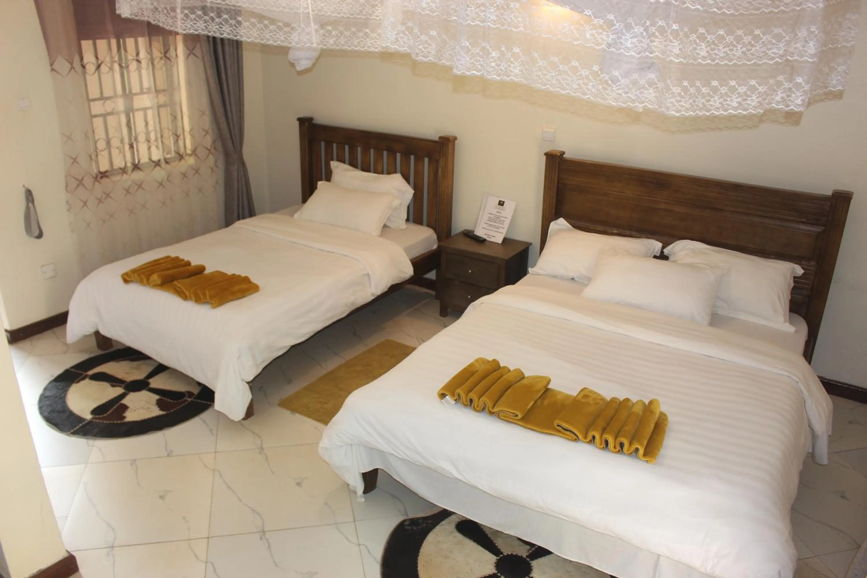 Bed in Montane Safaris Hotel