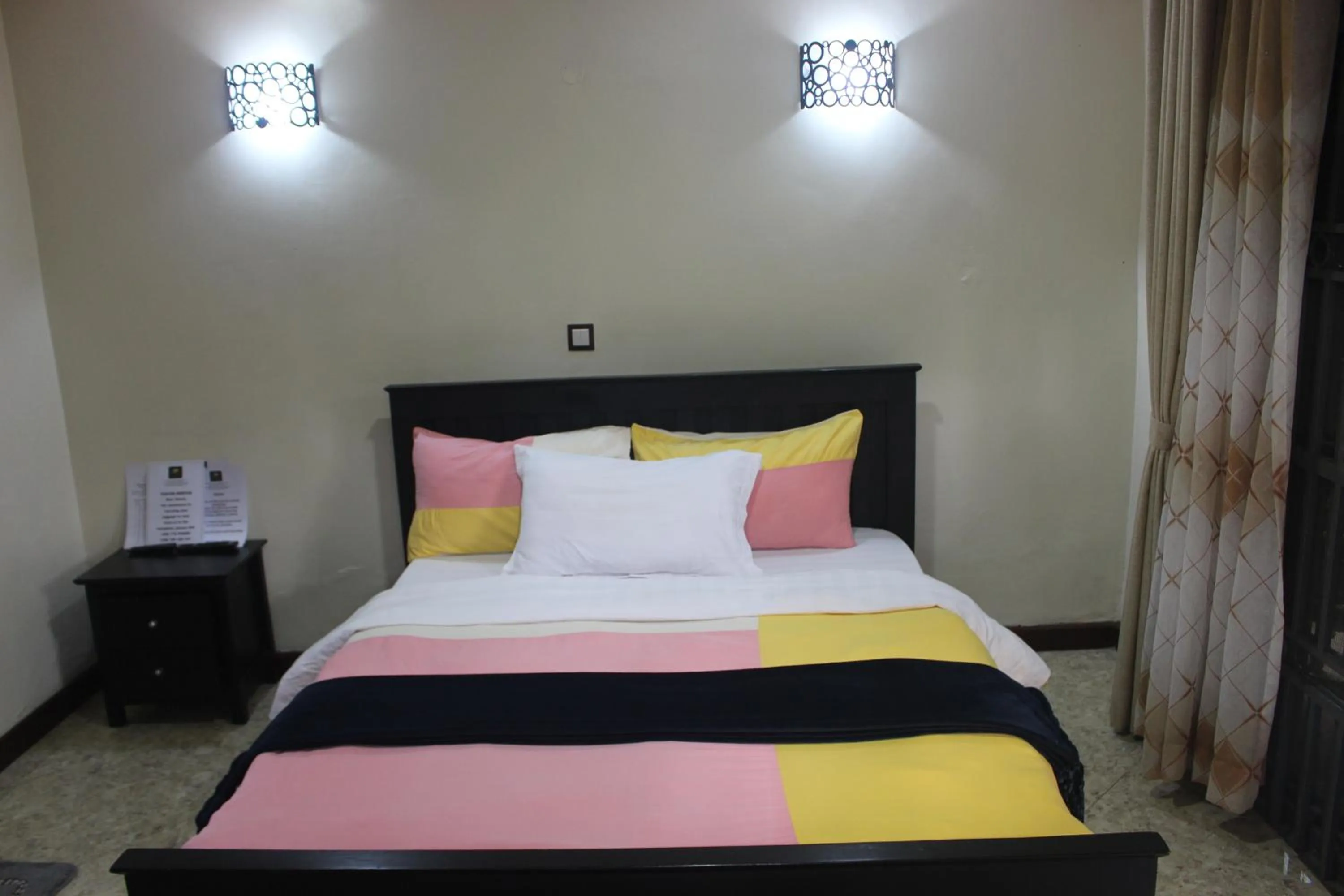 Bed in Montane Safaris Hotel