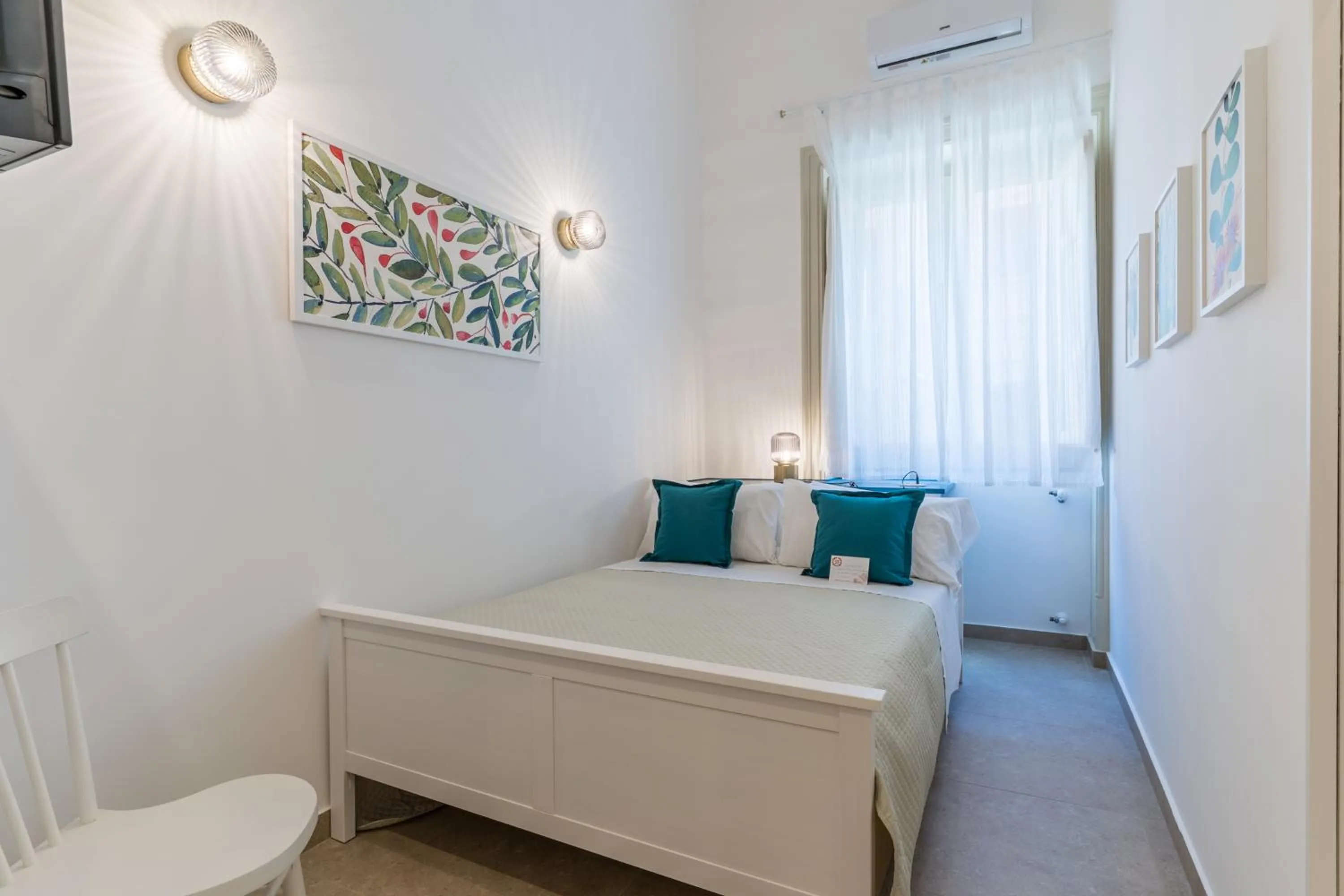 Bed in Mama Tita Rooms and Breakfast