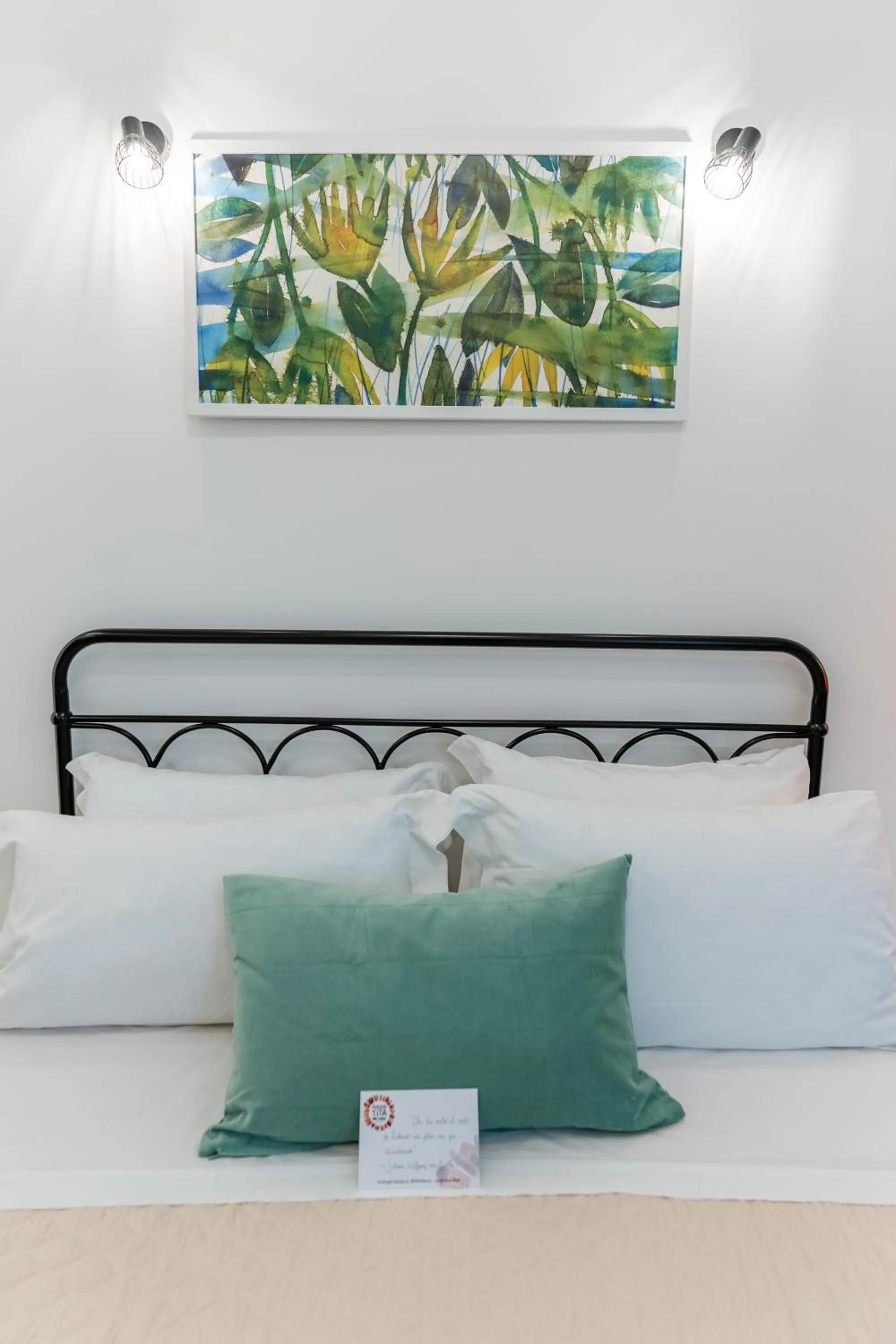 Bed in Mama Tita Rooms and Breakfast